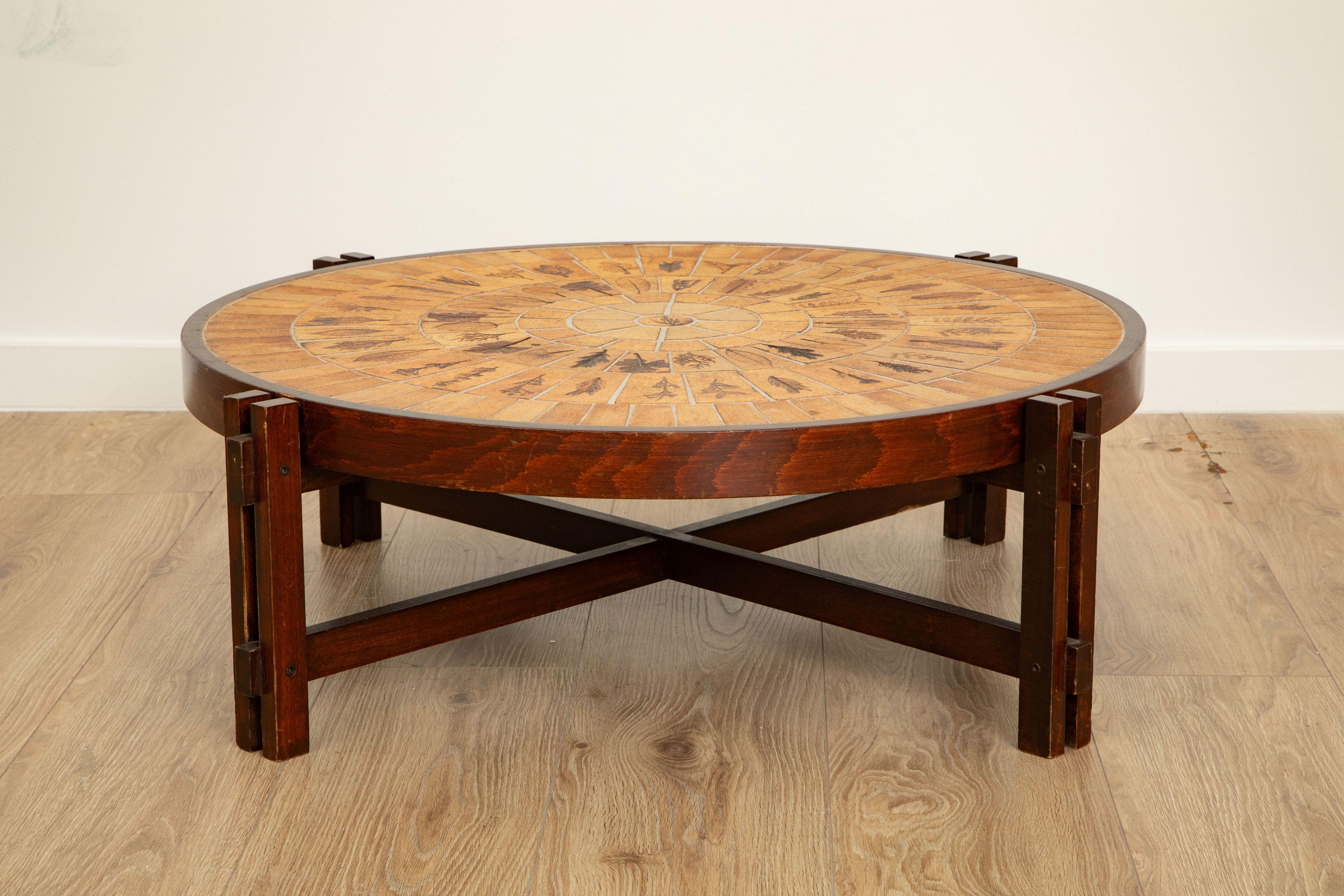 Roger Capron “Garrigue” Round Coffee Table, Ceramic Tile Top with Leaf Motif, France, circa 1970

“Garrigue” model round coffee table by Roger Capron, France, circa 1970. The top is composed of Capron’s signature hand-glazed ceramic tiles, each