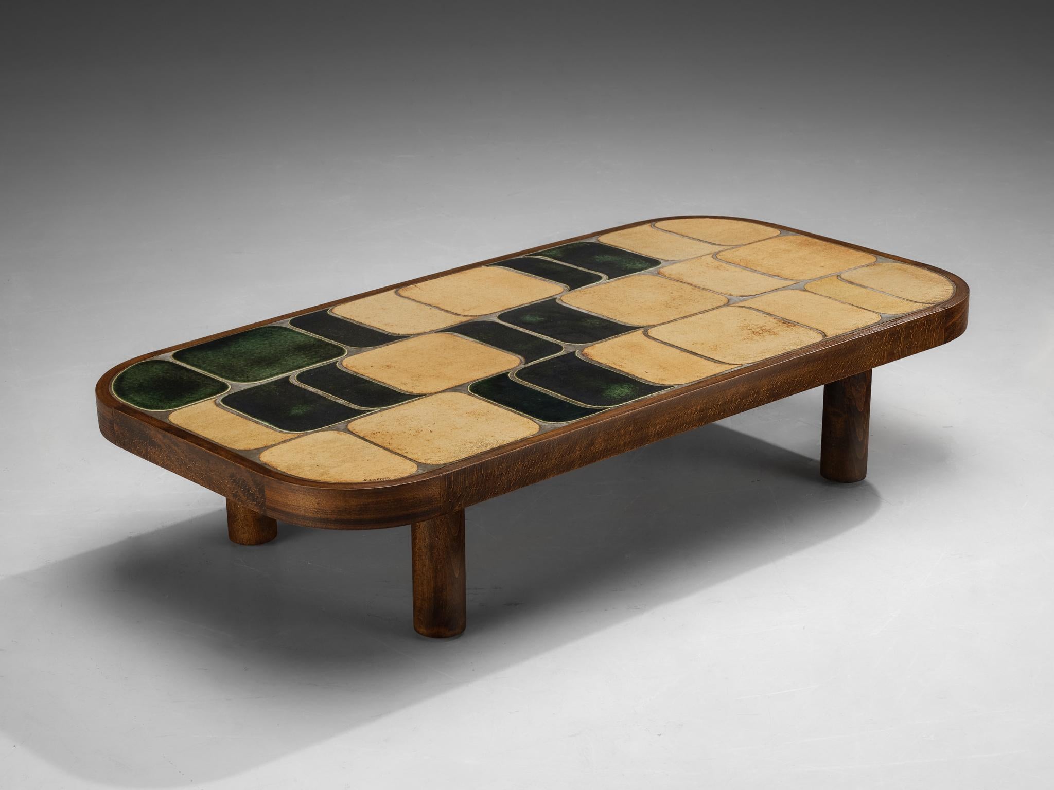 Roger Capron, 'Shogun' coffee table, ceramic, stained wood, France, 1960s

Lovely French coffee table with wonderful composed ceramic tiles by French designer Roger Capron. This specific model is the larger version within the 