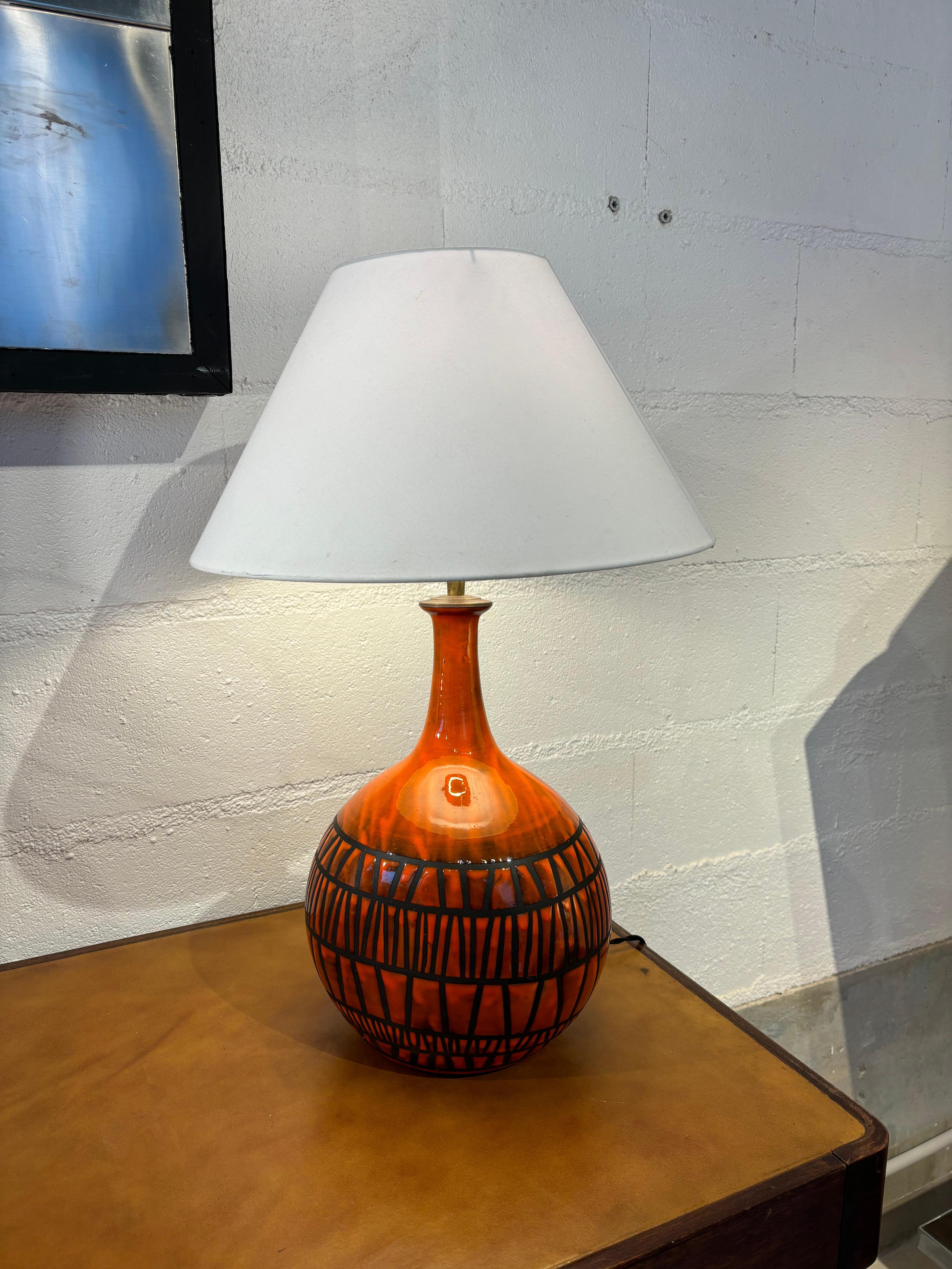 Scarce lamp by Roger Capron circa 1960. 
Original big lamp by Roger Capron with orange and black ennalemed. 
Really rare with this combinaison of colors. 

