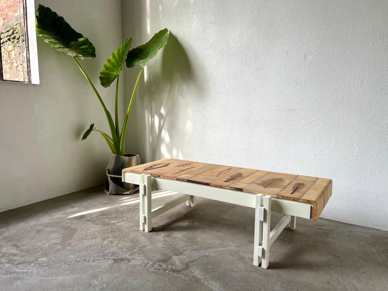 Coffee table by Roger Capron, Vallauris, France circa 1960.

Roger CAPRON (1922-2006). Maison Lecan offers you this rectangular coffee table with a ceramic tile top decorated with prints and plant motifs. Capron Vallauris signature on the board.