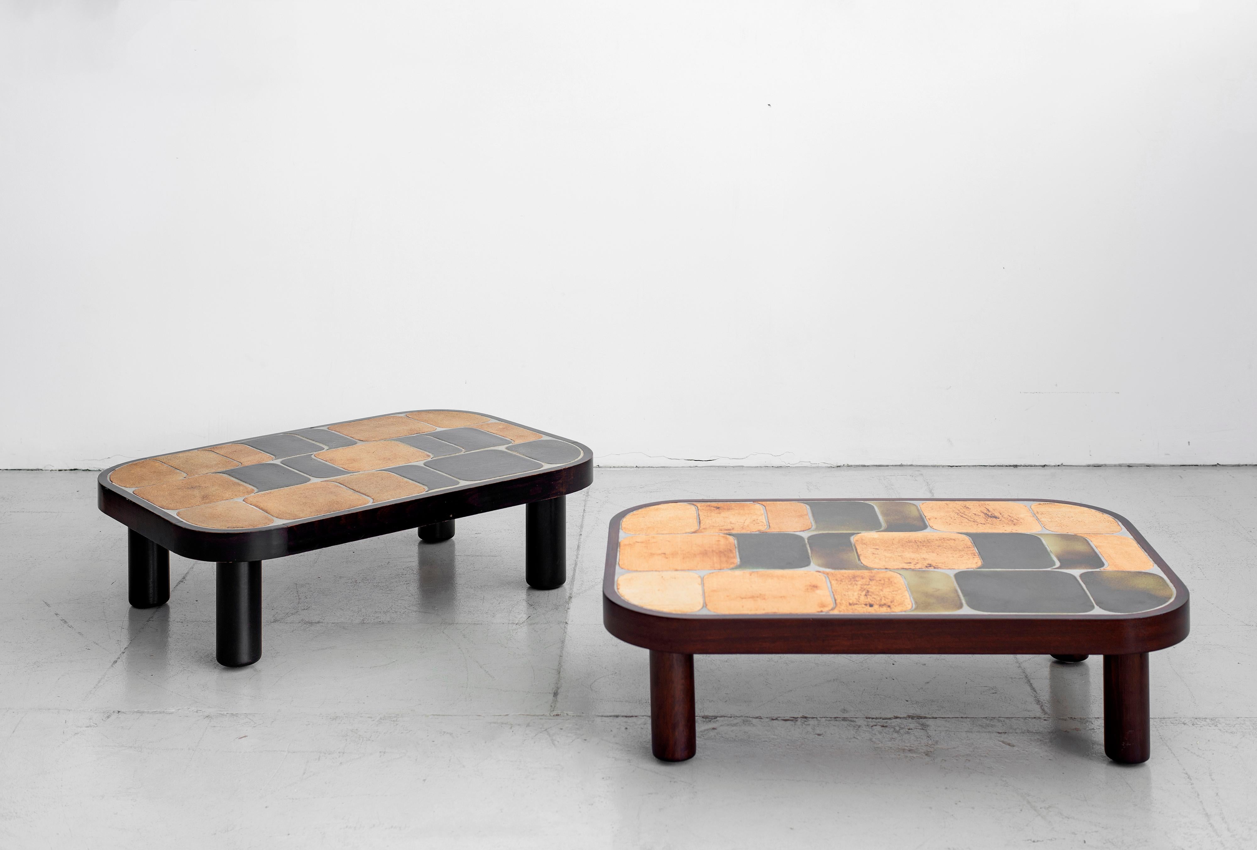 Wonderful ceramic tile top coffee tables designed by Roger Capron (signed). 
Features his unique 
