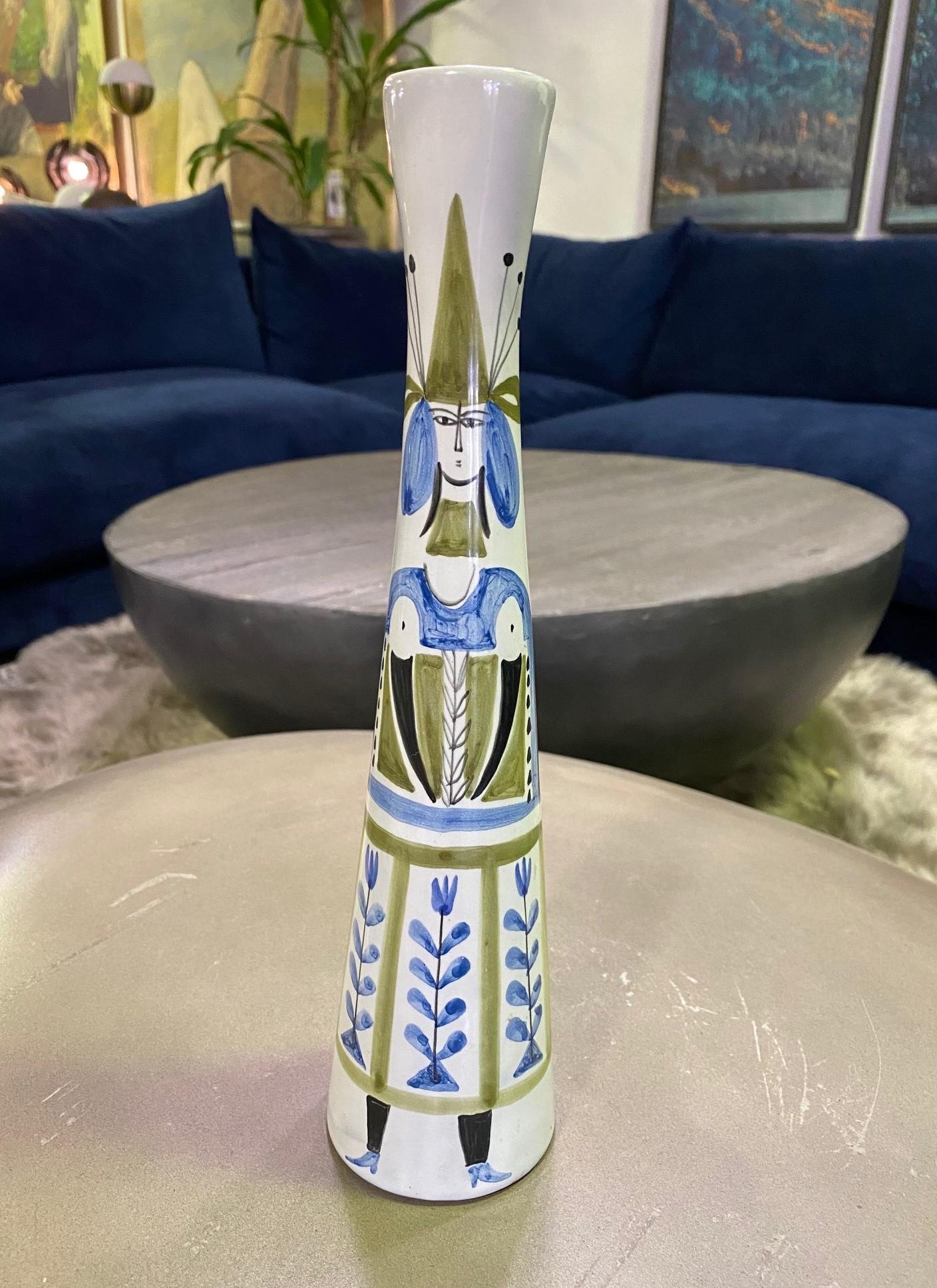 A wonderful, hand painted vase by famed French ceramist Roger Capron. Tall and slender in design. Rare and scarce as we have only seen one other example of this motif.

Would make for a fantastic addition to any French or Mid-Century Modern