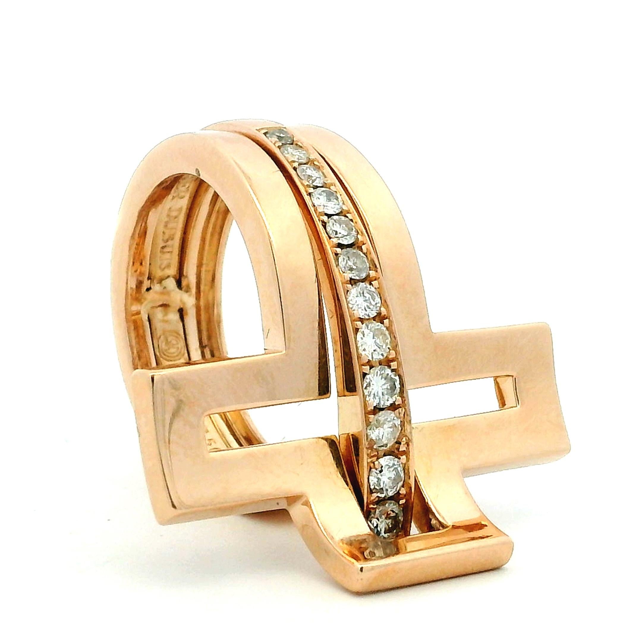 Un anello firmato Roger Dubuis, straordinario e da collezione, realizzato in oro rosa 18 carati, che mette in mostra l'inconfondibile estetica architettonica del marchio. Questo design all'avanguardia presenta un'audace silhouette traforata che si