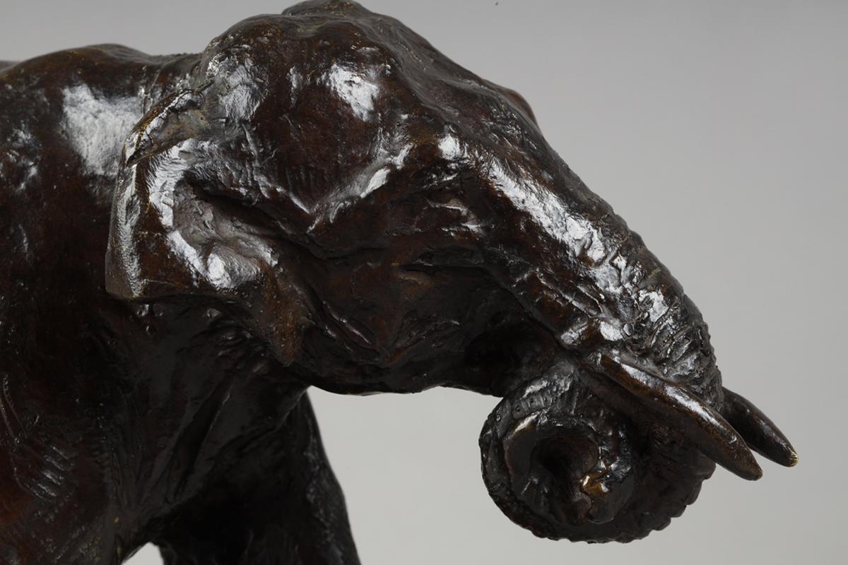 Elephant running with coiled trunk - Sculpture by Roger Godchaux