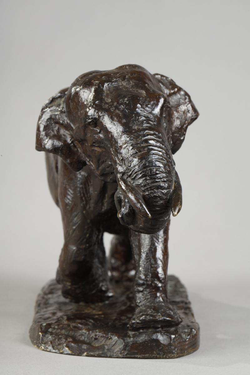 Elephant running with coiled trunk - French School Sculpture by Roger Godchaux