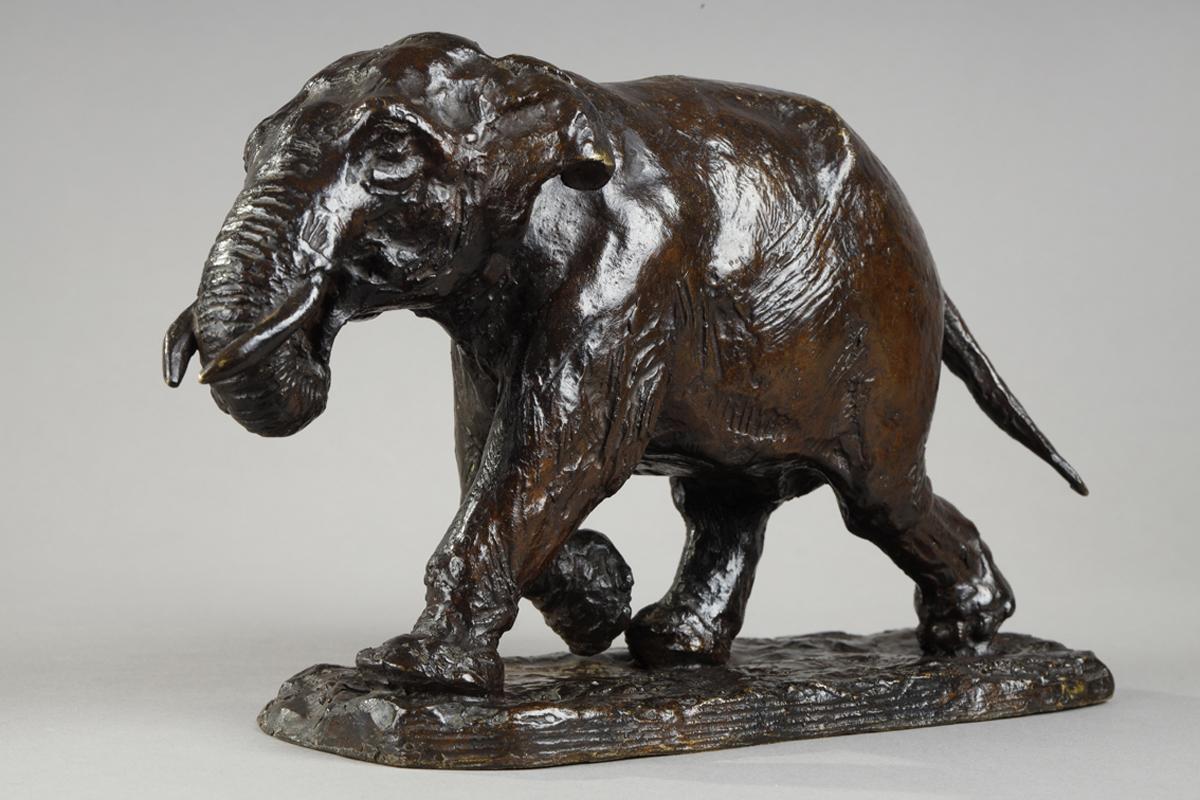 Elephant running with coiled trunk - Gold Figurative Sculpture by Roger Godchaux