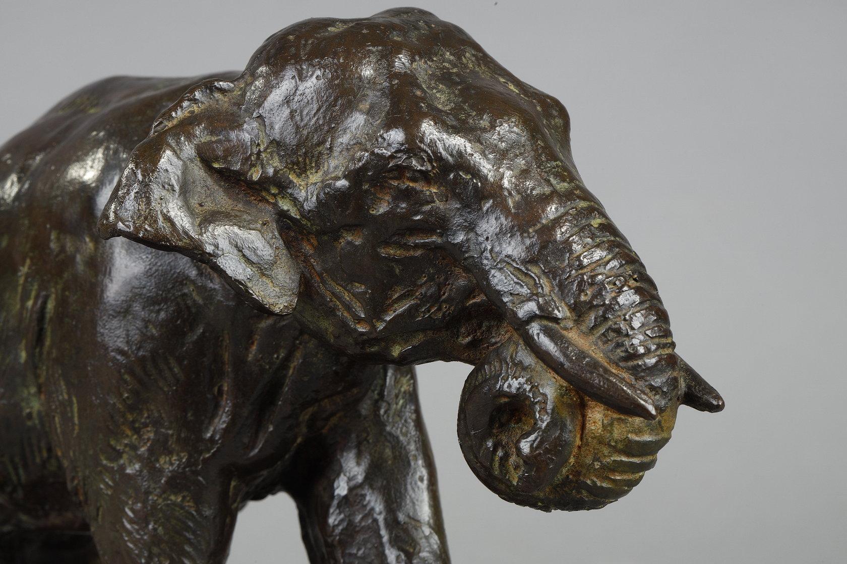 Elephant running with coiled trunk - Gold Figurative Sculpture by Roger Godchaux