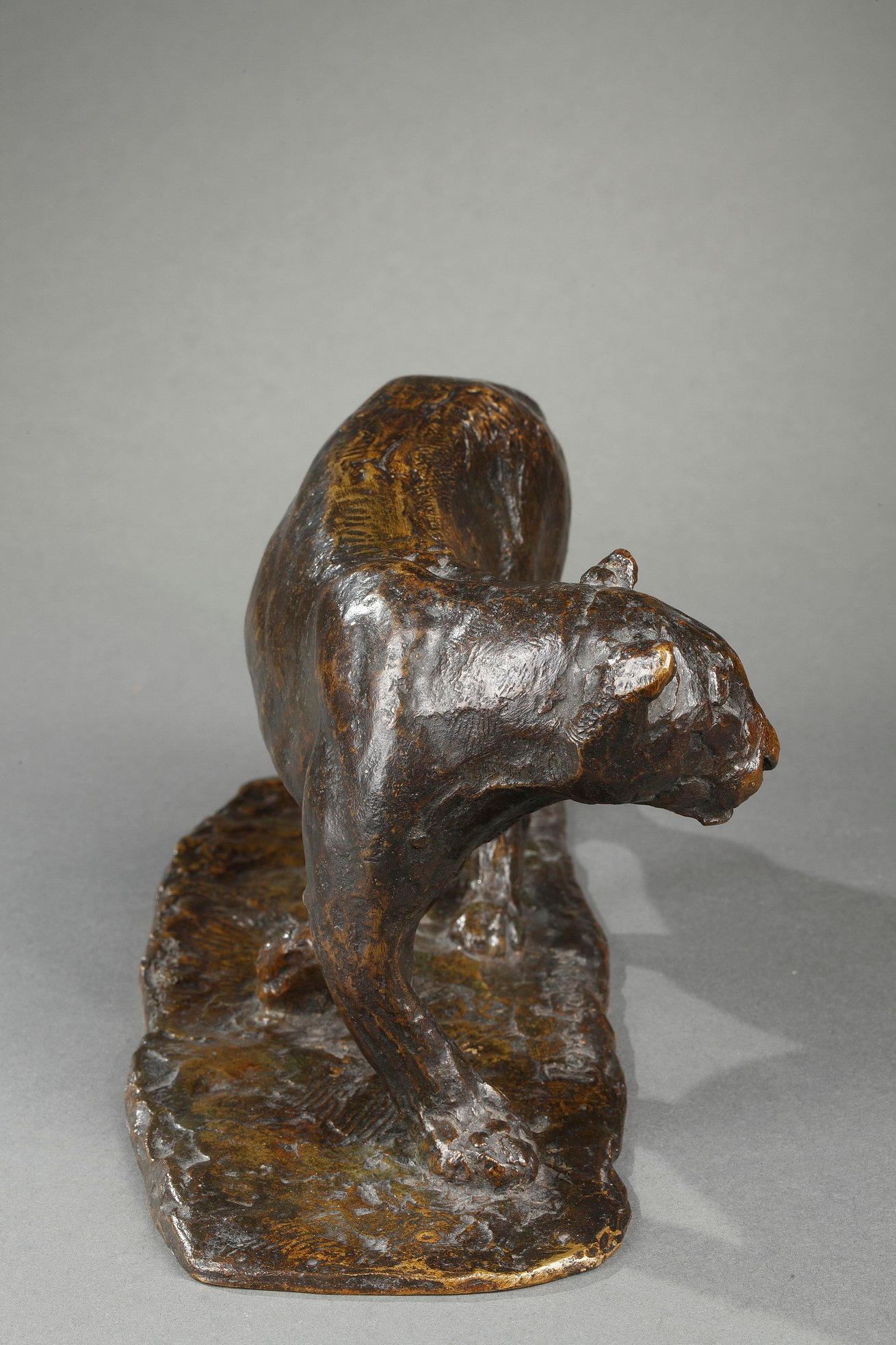 Lioness Turning - Gold Figurative Sculpture by Roger Godchaux