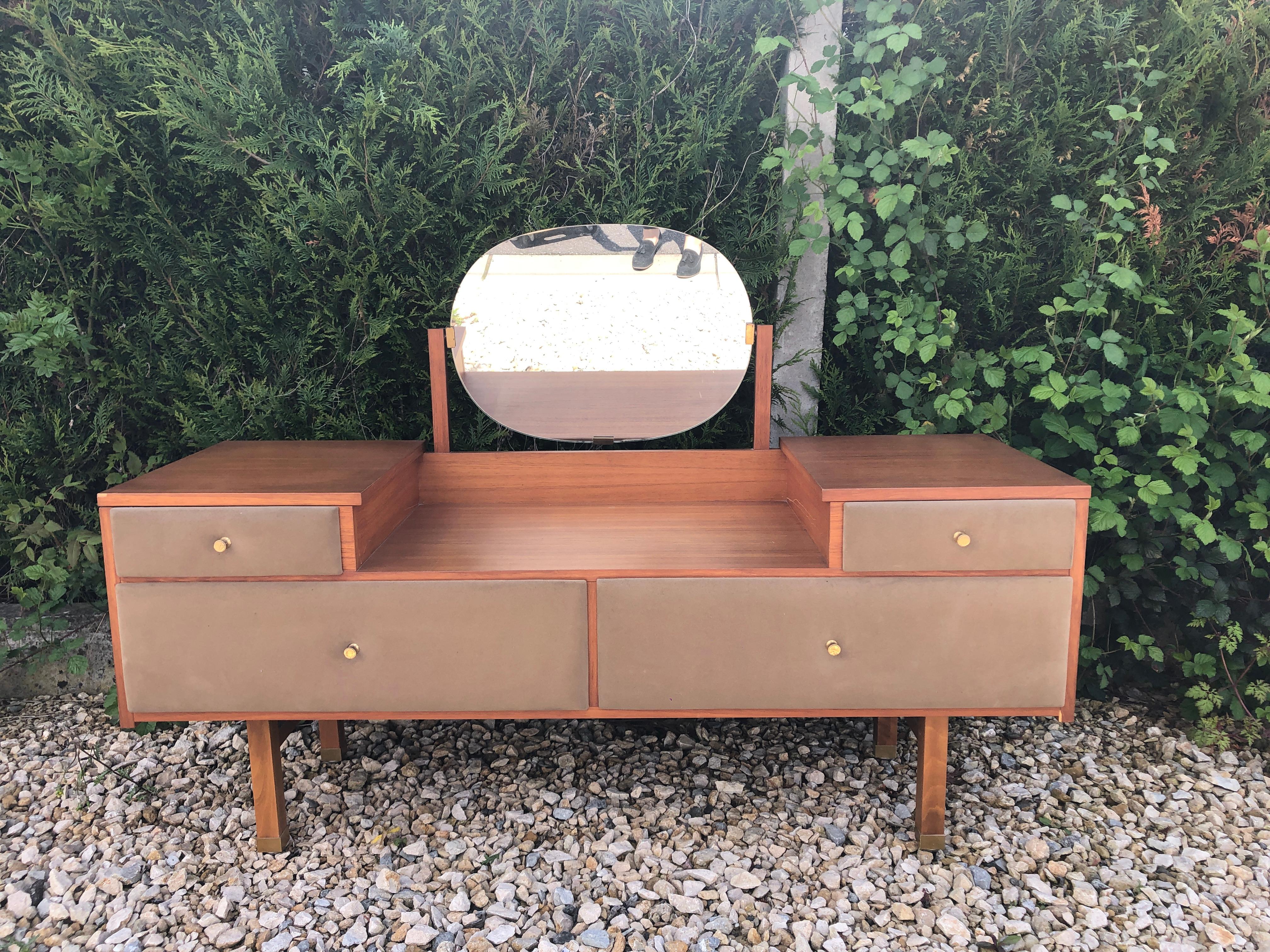 Beautiful vanity in teak with two drawers and two cases on top, brass legs and handles
Design Roger Landault in the 1950s.
 