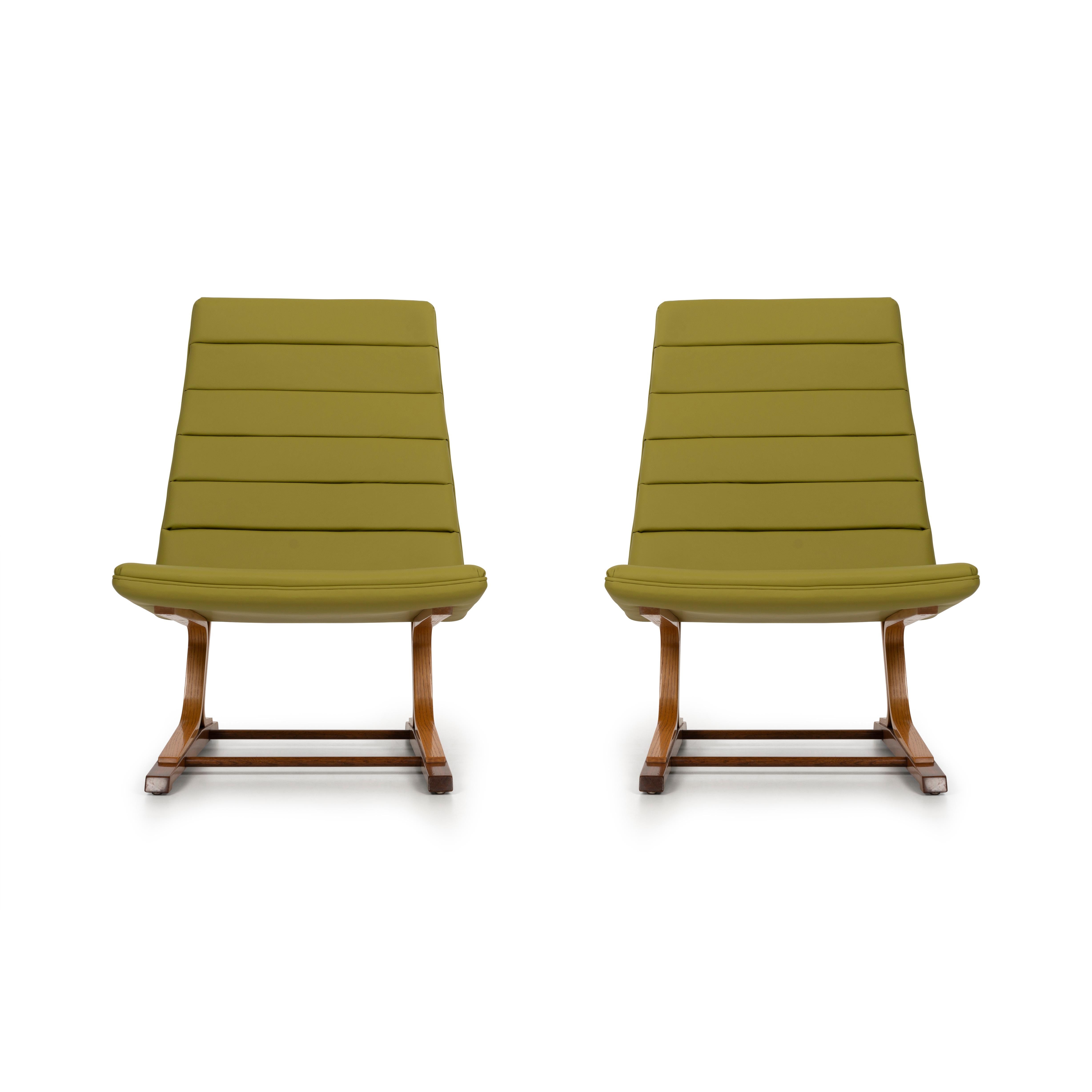 Roger Lee Sprunger for Dunbar pair of cantilever lounge chairs, model 480, oakwood and Mahogany two-toned base structures, oil finish, reupholstered with spinney beck leather.