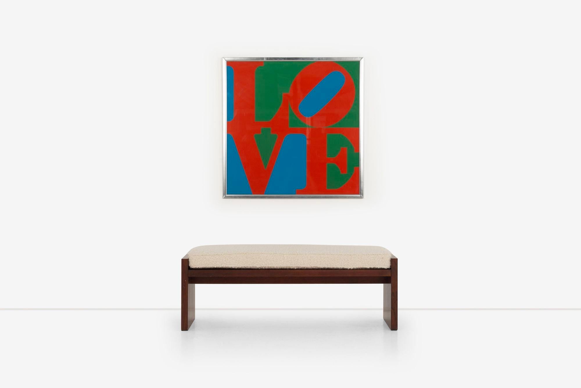 Roger Lee Sprunger for Dunbar Rosewood Bench 1965
This elegant plank bench designed by Roger Sprunger for Dunbar features extended vertical sides that allow for cushion placement, adding both style and functionality to your space. Adorned with the