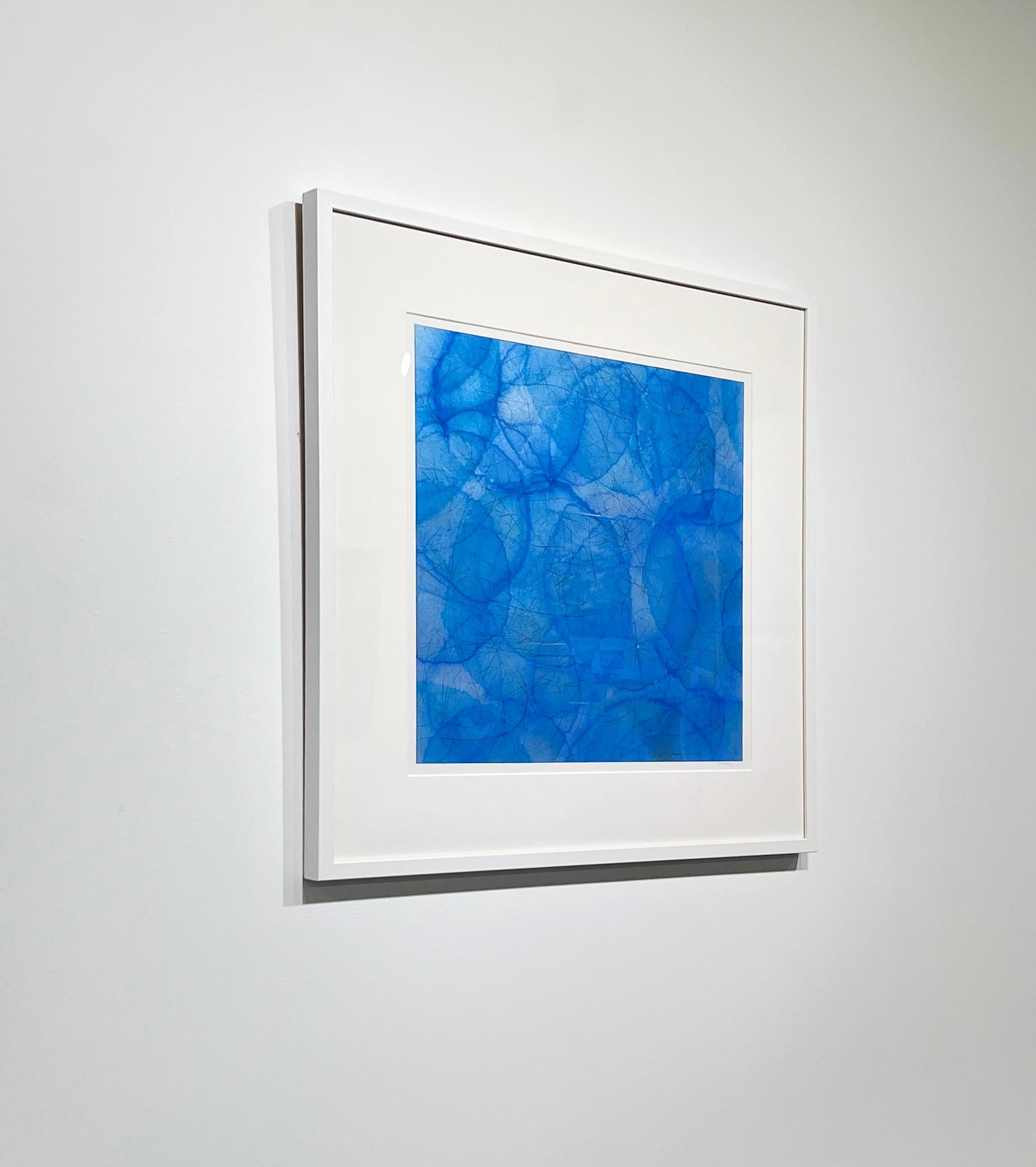 This abstract painting by Roger Mudre features a cool blue palette, with light circular shapes layered over one another throughout the composition. The painting itself is 20