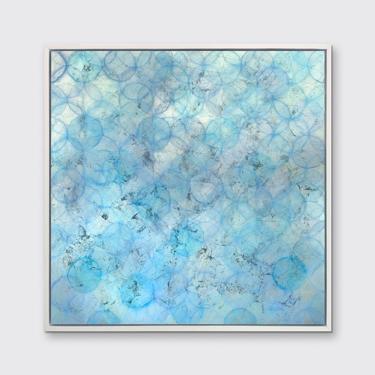 This abstract limited edition print by Roger Mudre features a light blue and silver palette, with warm, subtle pops of lavender layered throughout. Light outlined circular shapes are layered over one another and span out past the edges of the