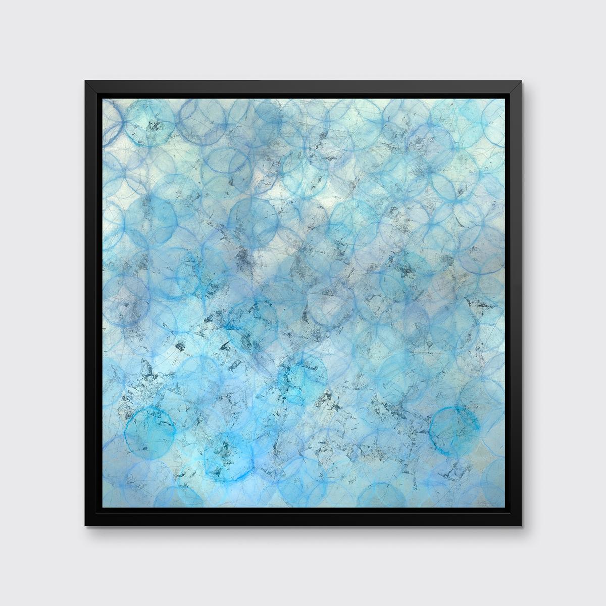 This abstract limited edition print by Roger Mudre features a light blue and silver palette, with warm, subtle pops of lavender layered throughout. Light outlined circular shapes are layered over one another and span out past the edges of the