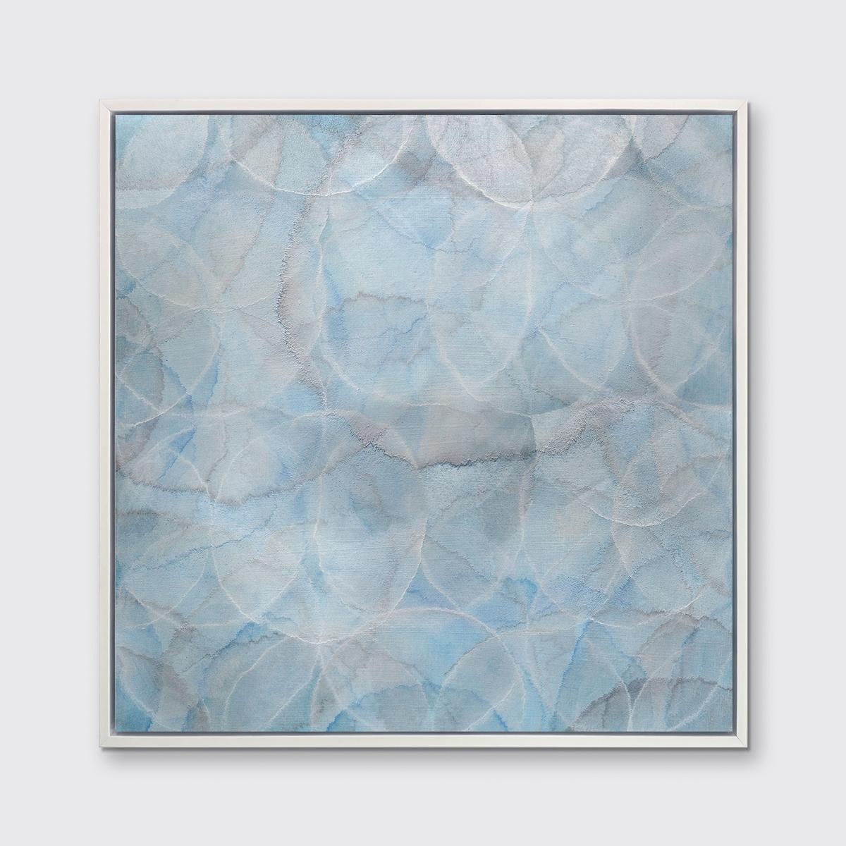 This abstract limited edition print by Roger Mudre features a cool blue, grey, and silver palette. The artist layers light outlines of circles over one another, which have an almost glowing aesthetic, which reaches out to all edges of the