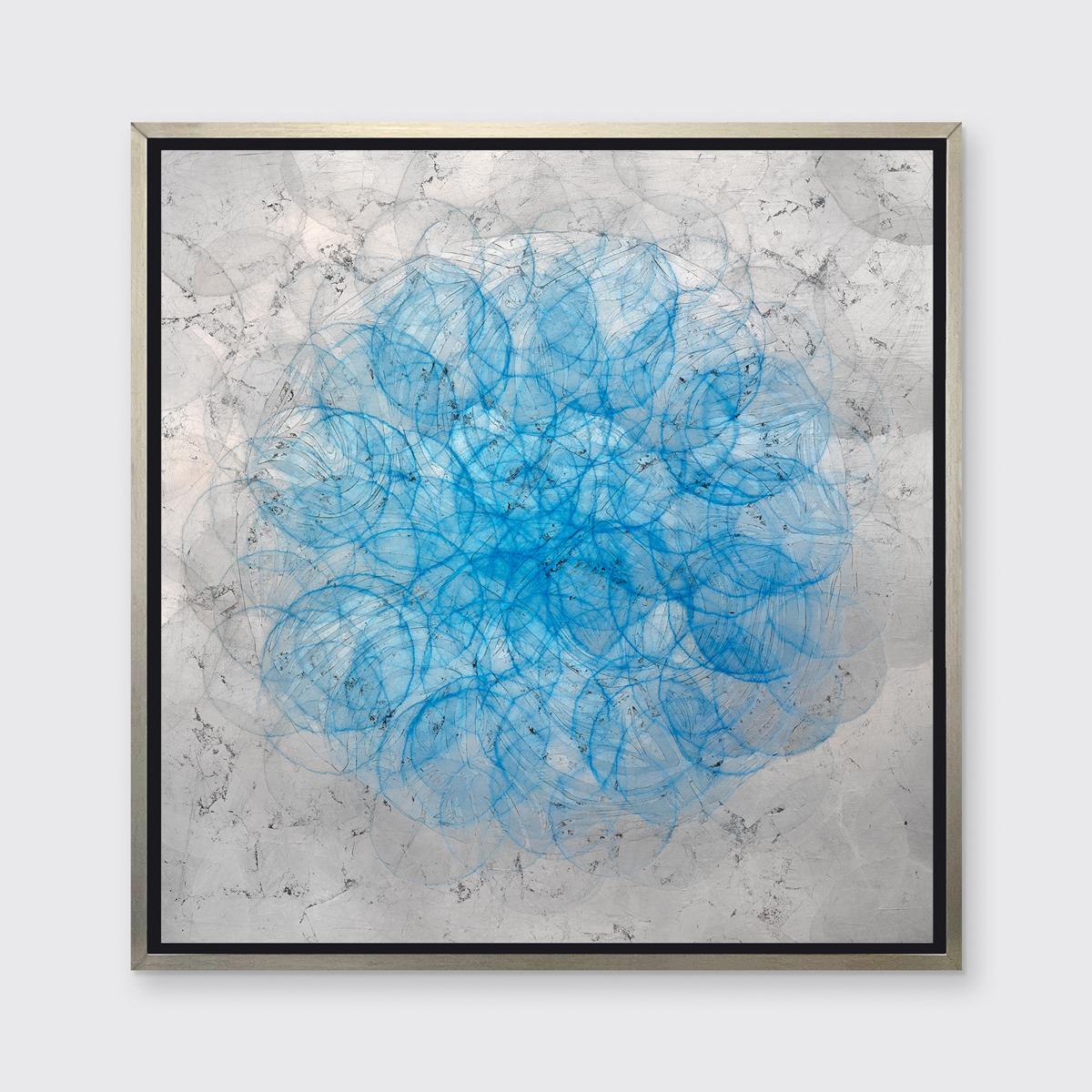 This abstract contemporary limited edition print by Roger Mudre features thin blue circular shapes which overlap one another to create a light, almost illusory larger circle at the center of the composition. Outside of this geometric circular shape,