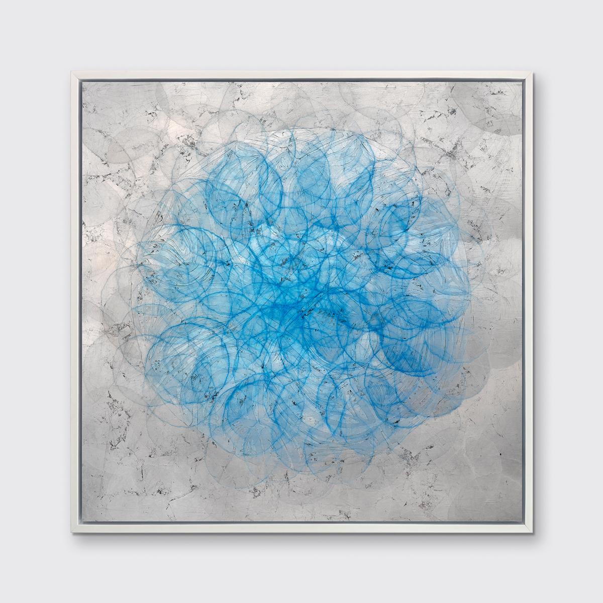 This abstract contemporary limited edition print by Roger Mudre features thin blue circular shapes which overlap one another to create a light, almost illusory larger circle at the center of the composition. Outside of this geometric circular shape,