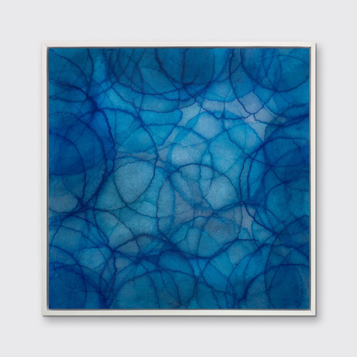 This Limited Edition giclee print by Roger Mudre features features a cool-toned palette with an iridescent quality. Circles with light outlines overlap one another in varying blue, green, white shades to create a larger blue circular form at the