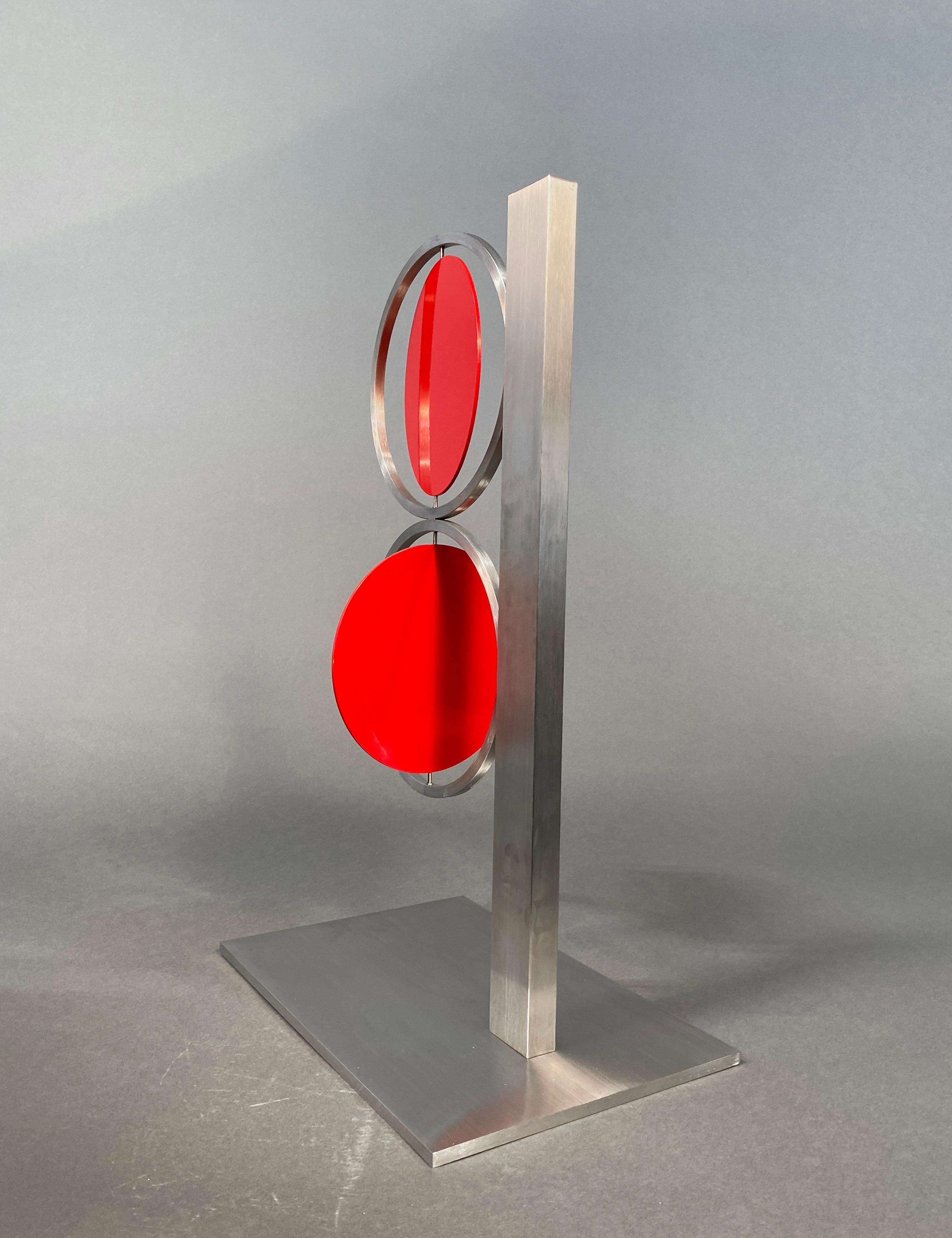 24 inch Red Figure Eight on Column - Sculpture by Roger Phillips