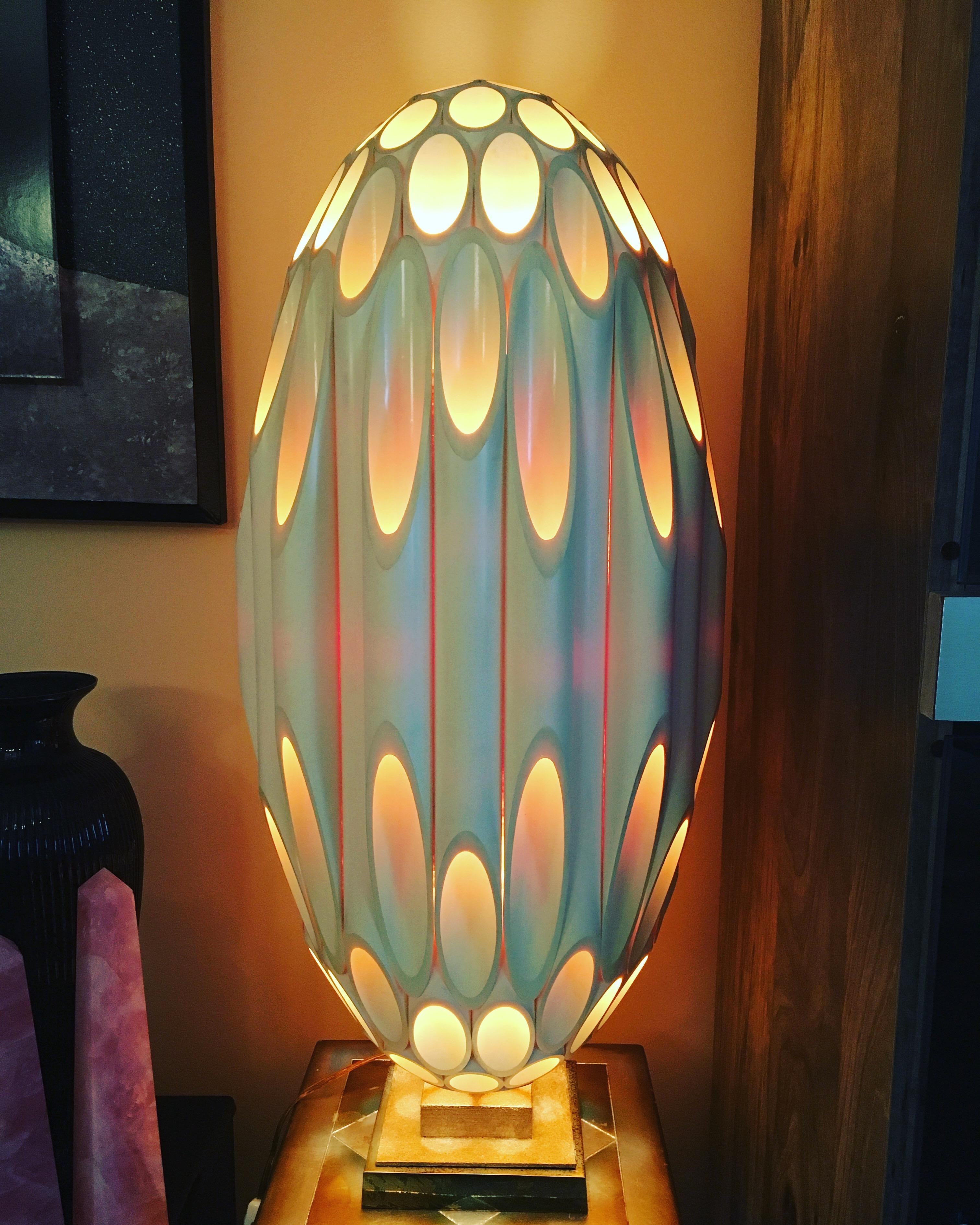 Impressive Roger Rougier Post Modern design table lamp. Fully signed on base and Canadian maple leaf label under base. This is more than just a table lamp, but a statement. Amazing warm display of light when it is lit up. Circa 1970-80. 

Very good