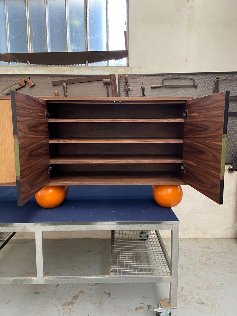 Side Cabinet with Coloured Veneered Doors and Orange Painted Round Legs In New Condition For Sale In London, GB