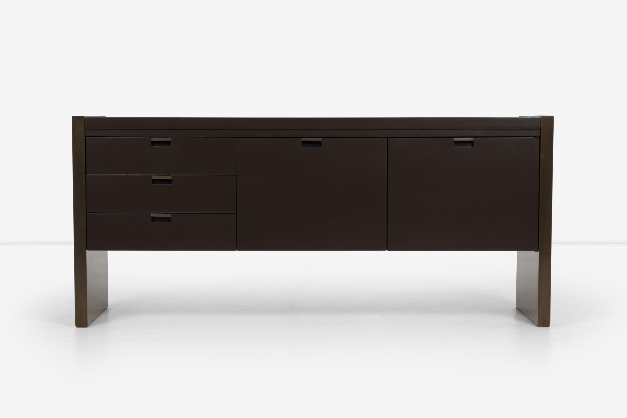 Roger Sprunger for Dunbar credenza, bronze sides with two file drawers and 3 pencil drawers.
(Dunbar label inside drawer).
