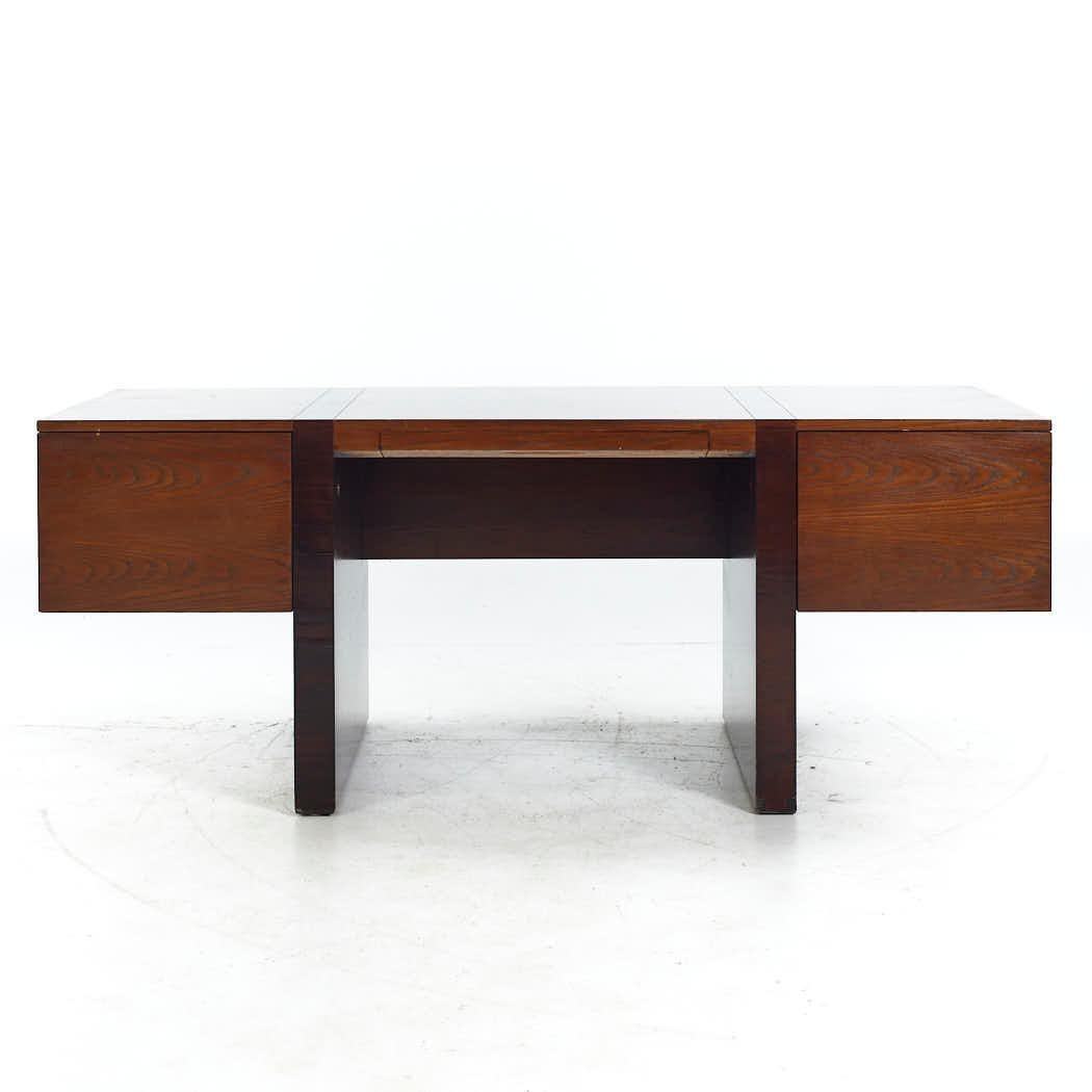 Roger Sprunger for Dunbar Mid Century Ebonized Oak Executive Desk

This desk measures: 74.25 wide x 33 deep x 29.25 high, with a chair clearance of 26 inches

All pieces of furniture can be had in what we call restored vintage condition. That means