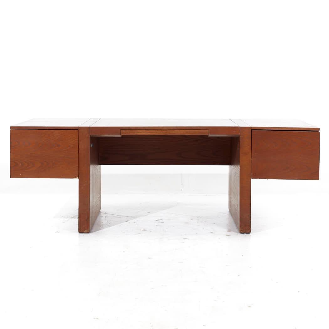 Roger Sprunger for Dunbar Mid Century Executive Oak Desk

This desk measures: 84.25 wide x 33 deep x 29.25 inches high, with a chair clearance of 26.25 inches

All pieces of furniture can be had in what we call restored vintage condition. That means