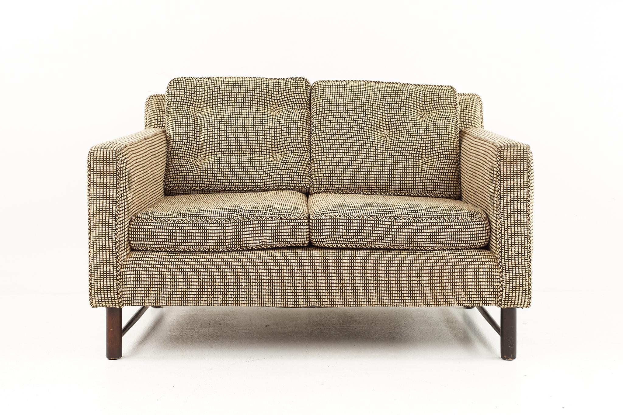Edward Wormley for Dunbar mid-century settee.

The settee measures: 48.5 wide x 32 deep x 28 high, with a seat height of 16 inches and arm height of 23.25 inches.

All pieces of furniture can be had in what we call restored vintage condition.