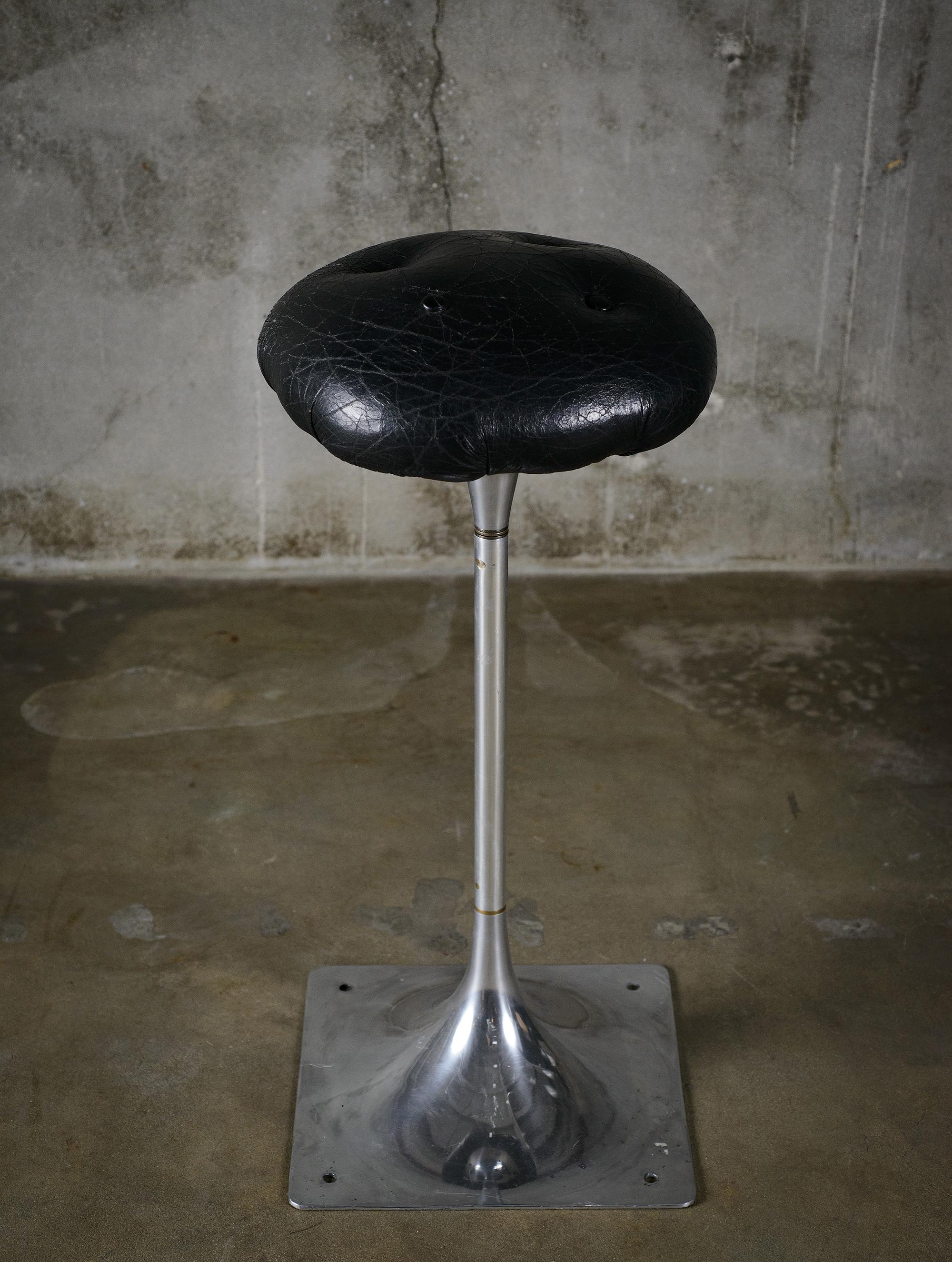 France: Roger Tallon leather, aluminium and brass bar stool, 1970s.