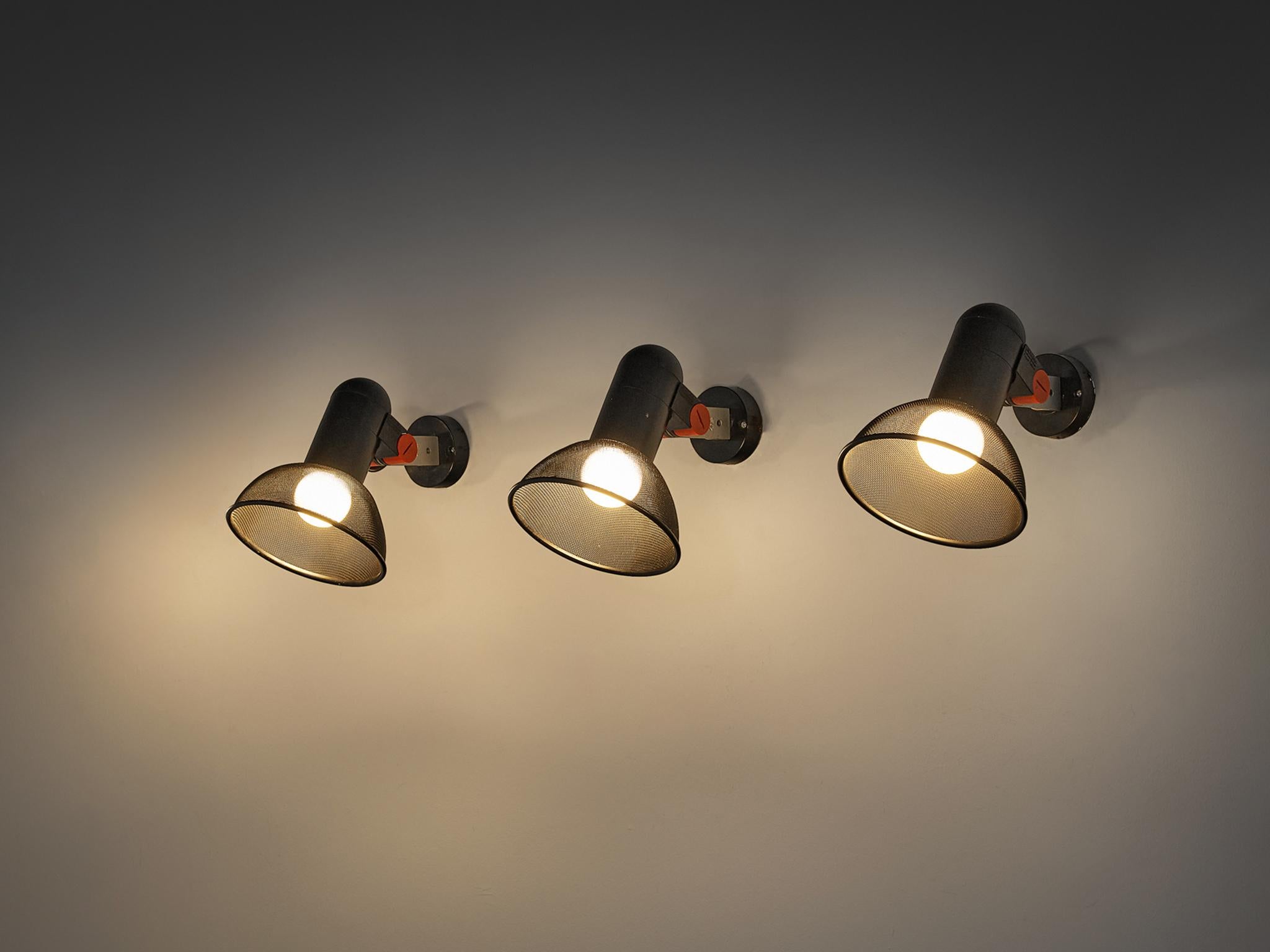 Roger Tallon for Erco, 'Spot' wall lights, iron, lacquered metal, metal, plastic, France, 1970s.

These wall lamps are icons made by Erco and designed by the French designer Roger Tallon. The black and white lamps feature bright red details and an