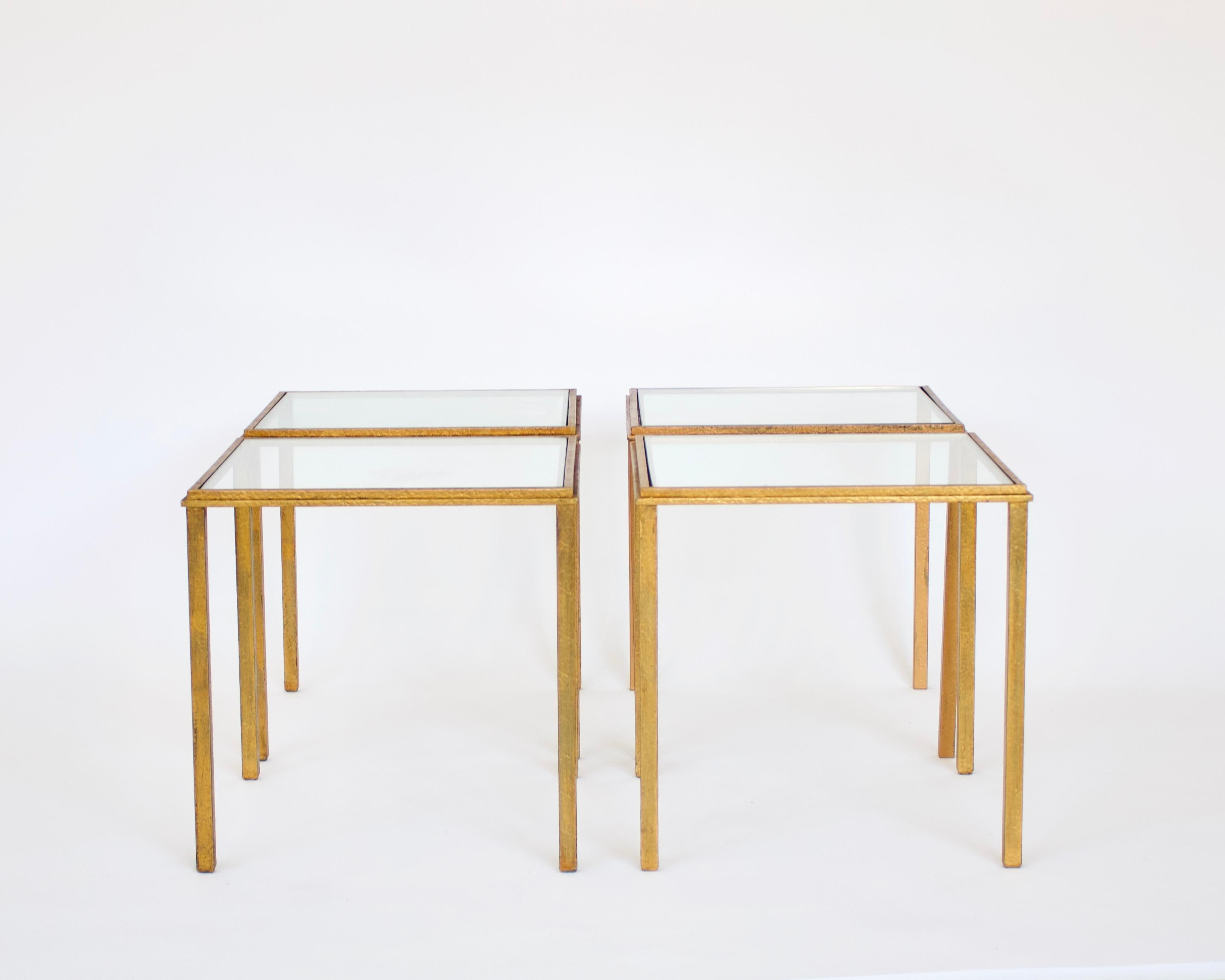 Roger Thibier gilded iron side tables or pair them as a small coffee table.
Move them around to make a modular coffee table or side tables. Patina as shown. 
Stamped R Thibier.
Measures: H 14 in. x W 14 in. x D 14 in. each