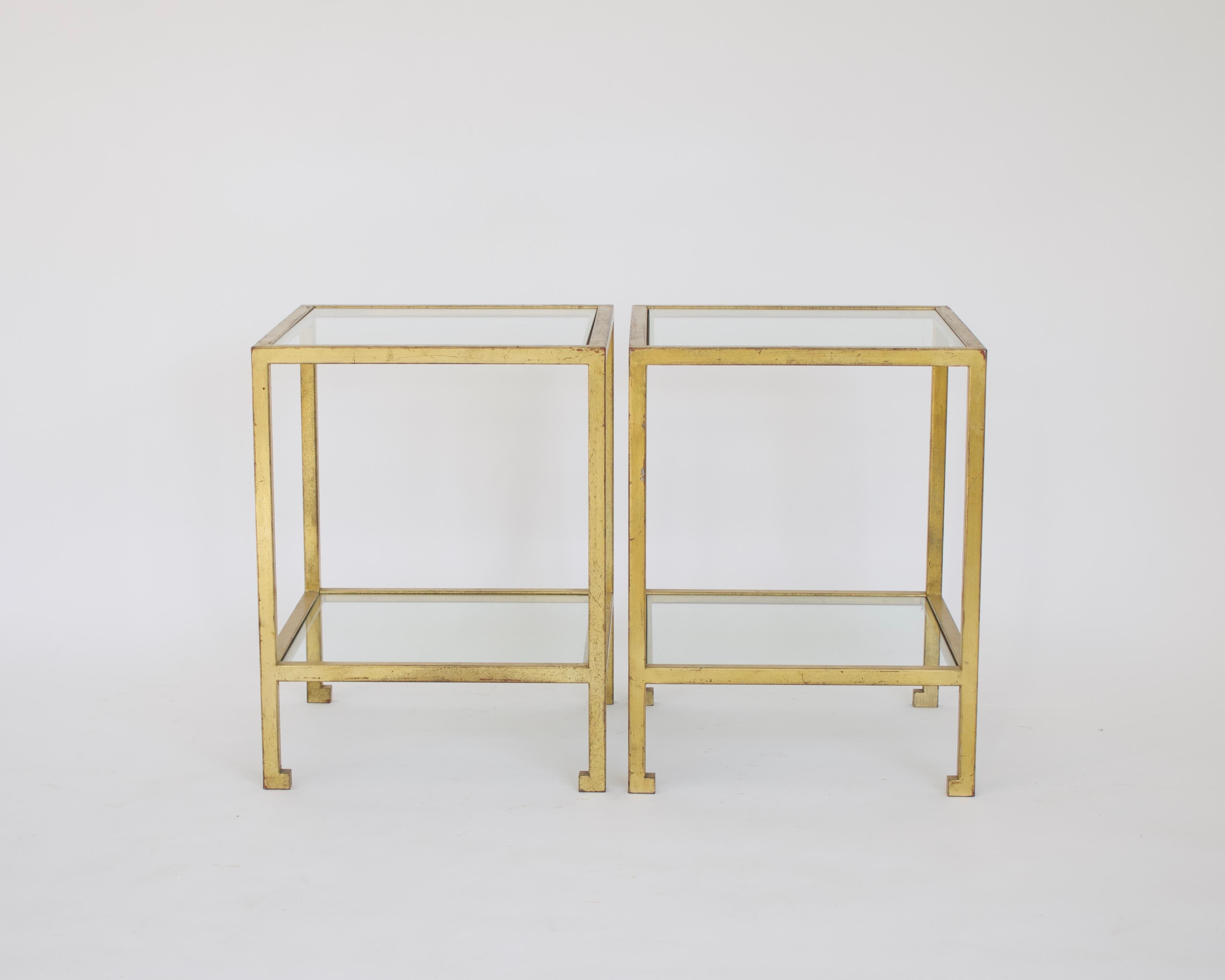 Roger Thibier French gilded wrought iron two level side or end tables with Neo classical feet. 
The total height is 20.5
