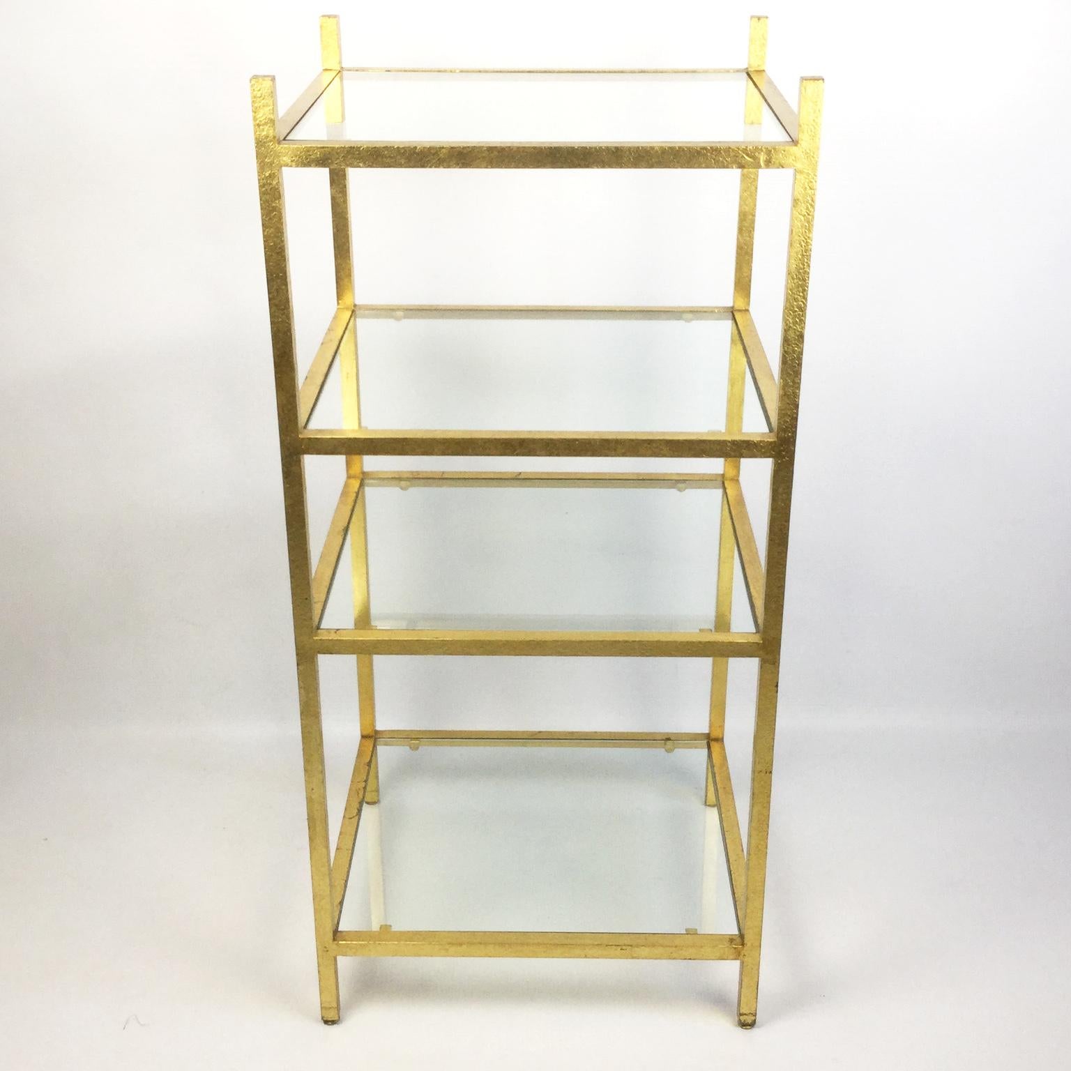 Neoclassical French gilded shelf from the midcentury, by the decorators and designers Roger and Robert Thibier from 1960s
The frame is composed of wrought iron legs gilded with gold leaf and four adjustable feet.
Original and good condition