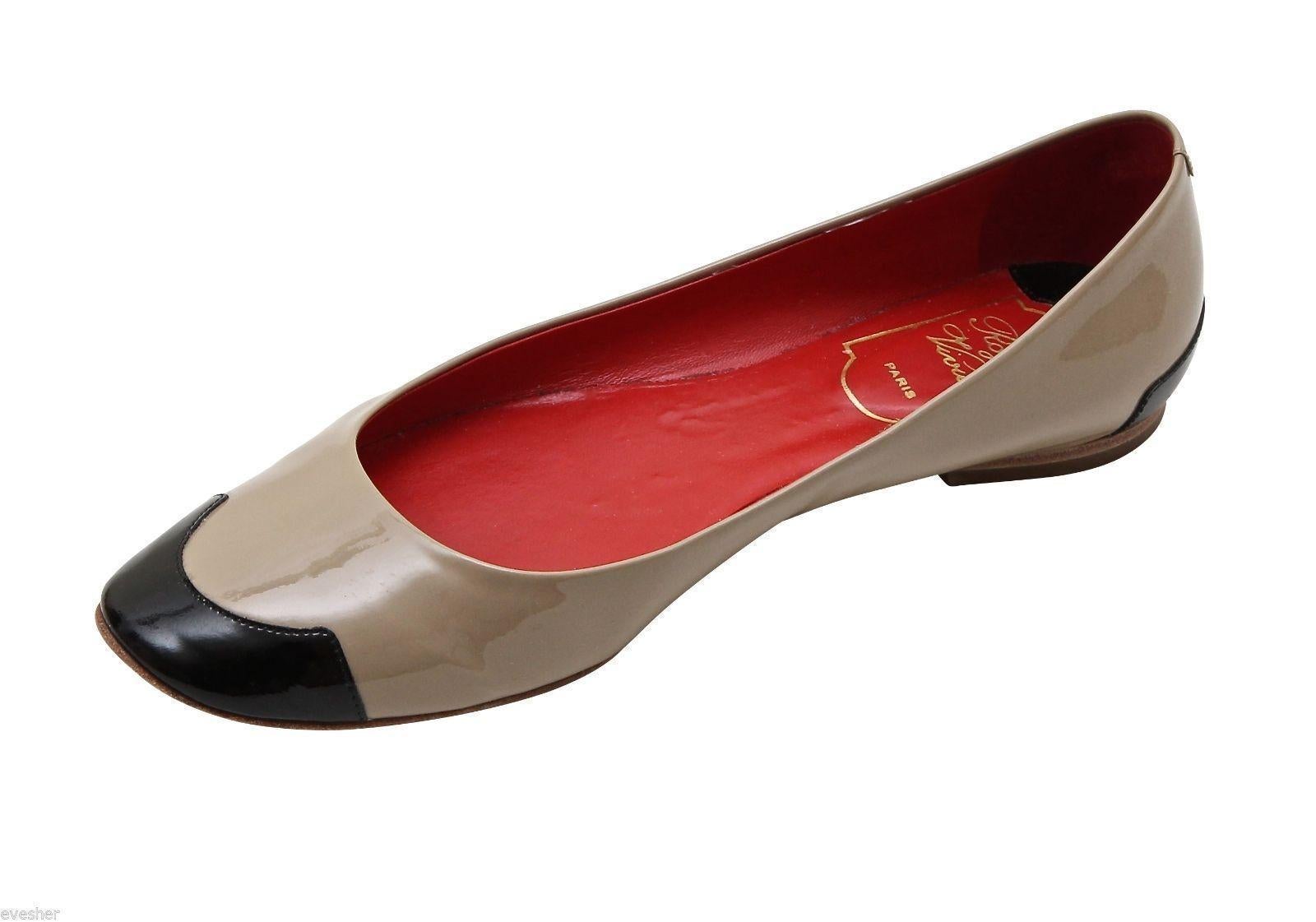 GUARANTEED AUTHENTIC ROGER VIVIER BALLET HELLO COCO T.05 CLASSIC FLATS

Details:
 - Taupe patent leather uppers with black patent leather trim at toes and heels
 - Rounded toe
 - Leather insole and sole
 - Comes with original Roger Vivier shoe