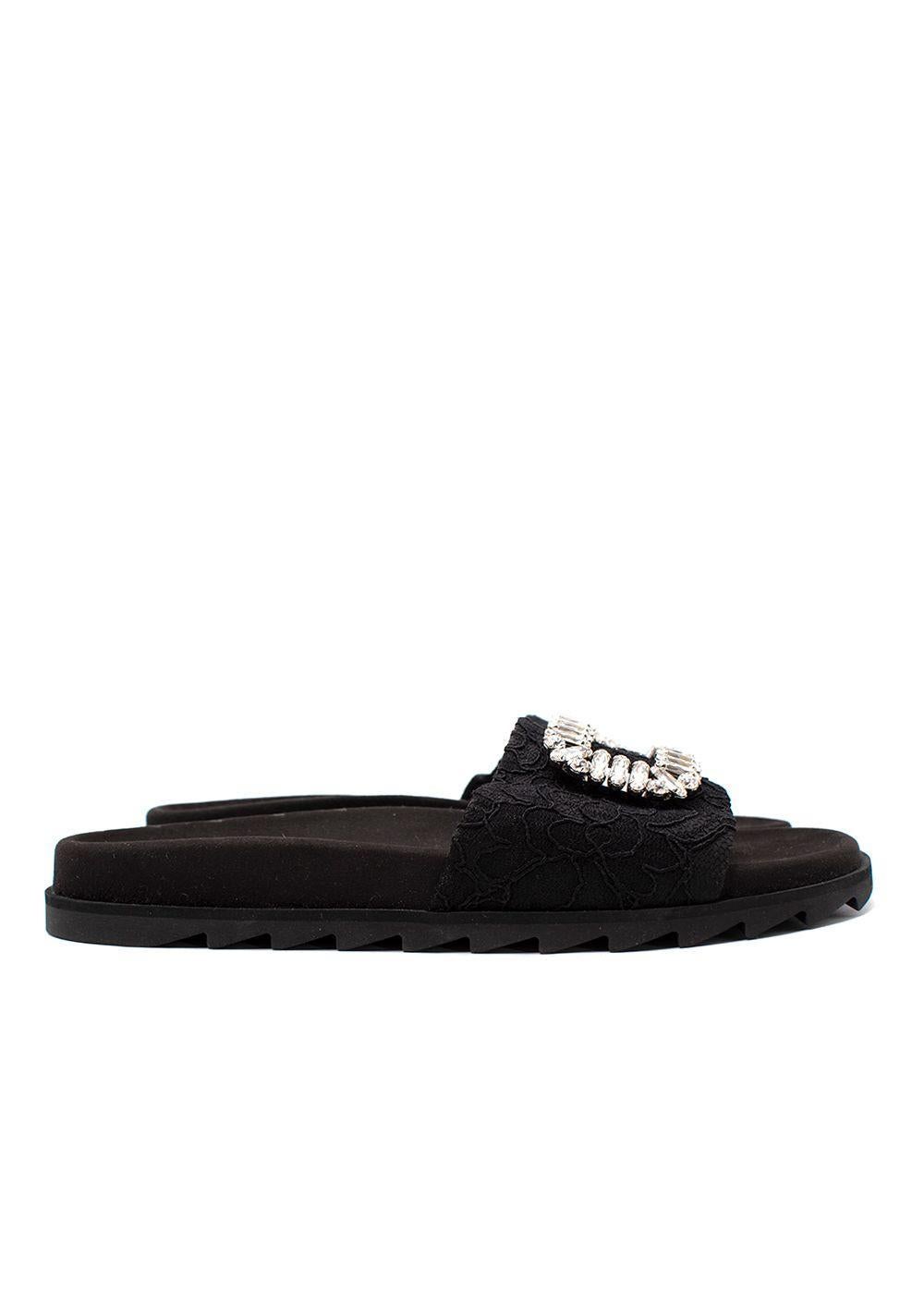 Roger Vivier Black Corded Lace Crystal Embellished Sliders

- Slip-on slider style sandal
- Black corded lace wrapped strap, adorned with a crystal-encrusted rectangular brooch
- Suede-lined footbed
- Ridged rubber