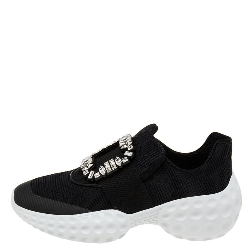 Look your stylish best every time you step out wearing these Viv Run Light sneakers from the House of Roger Vivier. They are made from black nylon on the exterior with a crystal-embellished motif perched on their vamps. They are made in a slip-on