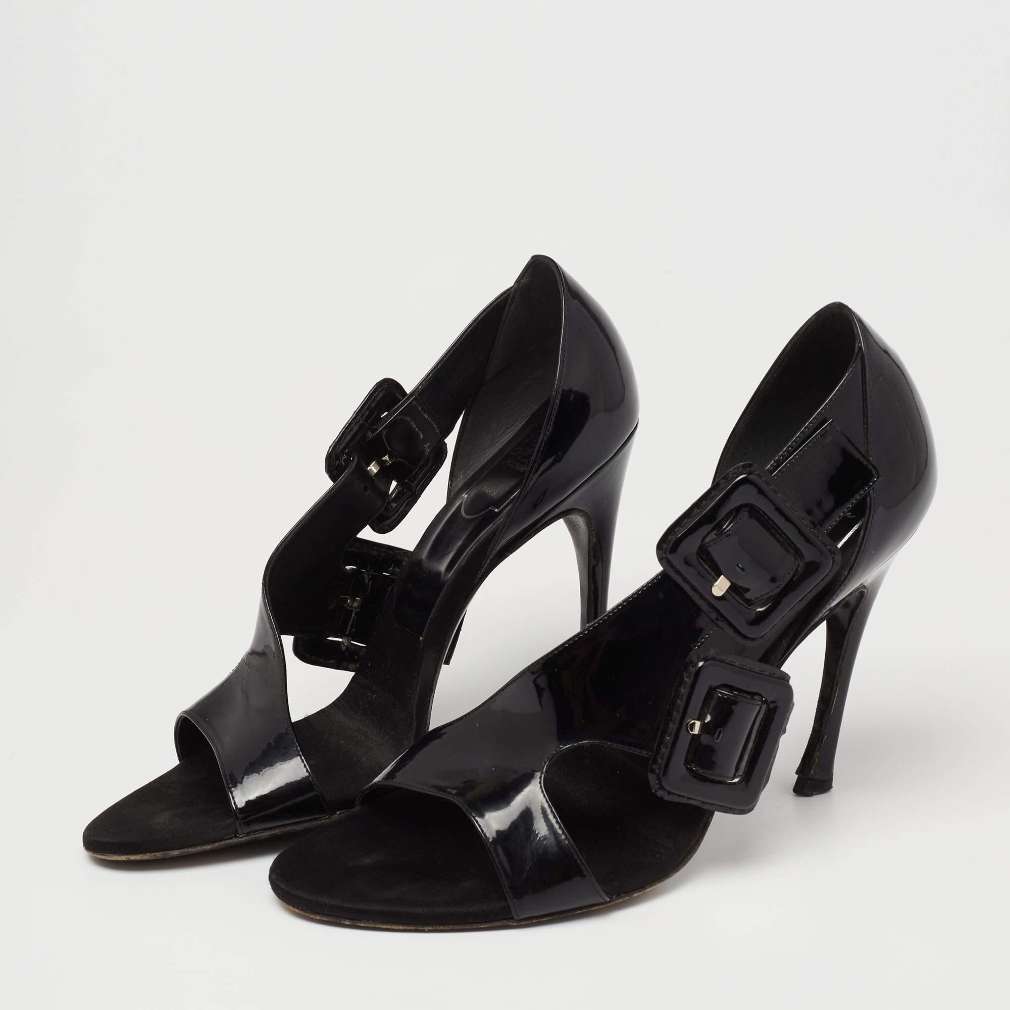 With an elegant d'Orsay style, these sandals from Roger Vivier sandals are chic and contemporary. Their patent leather upper is decorated with multiple buckle designs and is set on 11cm heels. The silver-tone accents add to the charm of the shoes. 