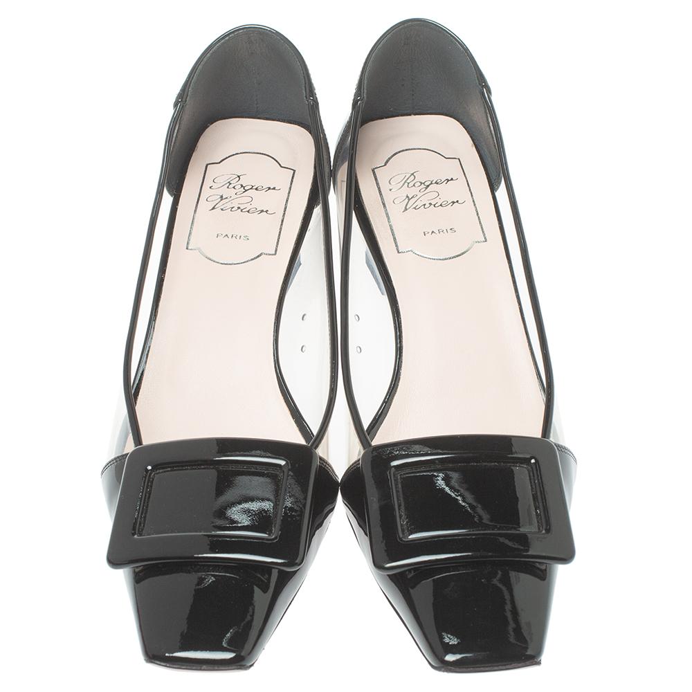 Beautifully blending fashion and comfort, these pumps from Roger Vivier are one of a kind! They are crafted from black patent leather and styled with PVC panels on the sides. They flaunt square toes with the signature rectangular accents on the