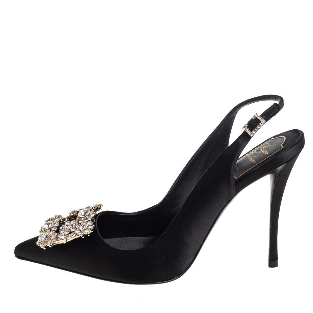 Roger Vivier is well-known for its graceful designs, and the label is synonymous with opulence, femininity, and elegance. These pumps are crafted from satin in a black shade into a pointed toe silhouette augmented by the embellishments perched on