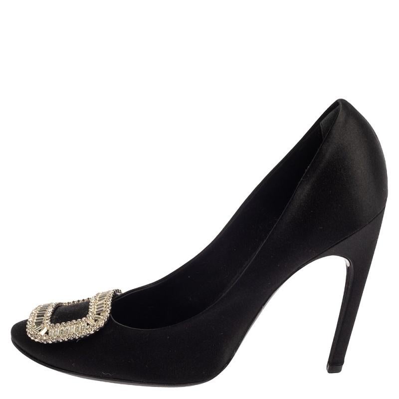 These Trompette pumps from Roger Vivier prove that fashion and comfort can go hand in hand too! The black pumps are crafted from luxe satin and feature round toes with embellished buckles on the vamps. They flaunt comfortable satin-lined insoles,