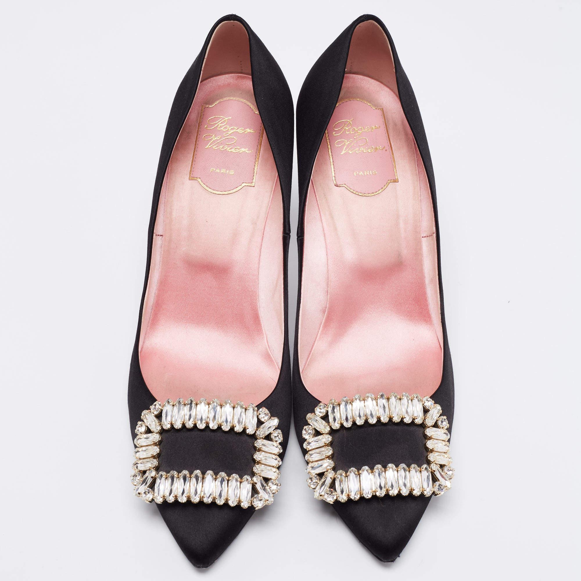Creations from Roger Vivier are simply beautiful and have a truly timeless appeal. These black pumps validate just that! They are crafted from satin and feature pointed toes. They flaunt the shimmering embellished accents on the uppers and stand