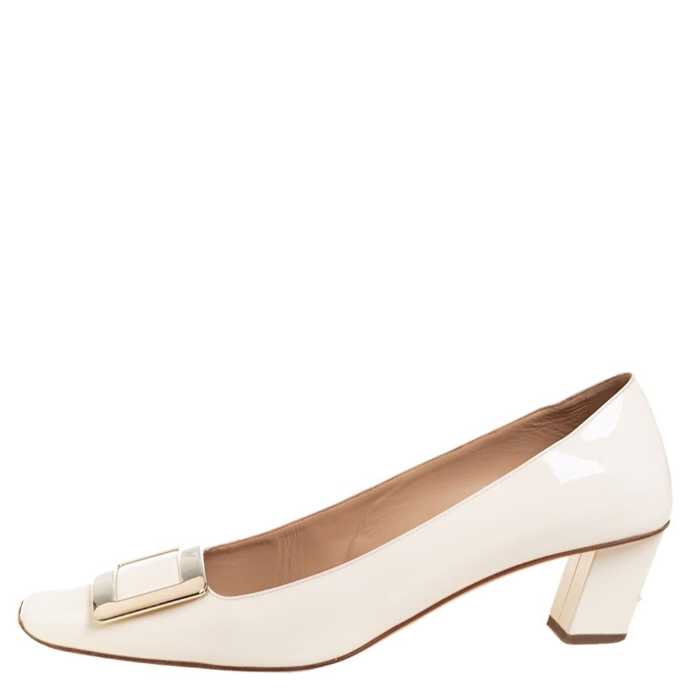 A gorgeous pair of pumps from the house of Roger Vivier to highlight your fabulous styling choices. Crafted from cream-hued patent leather, they feature square toes and come equipped with comfortable leather-lined insoles and block heels.

Includes: