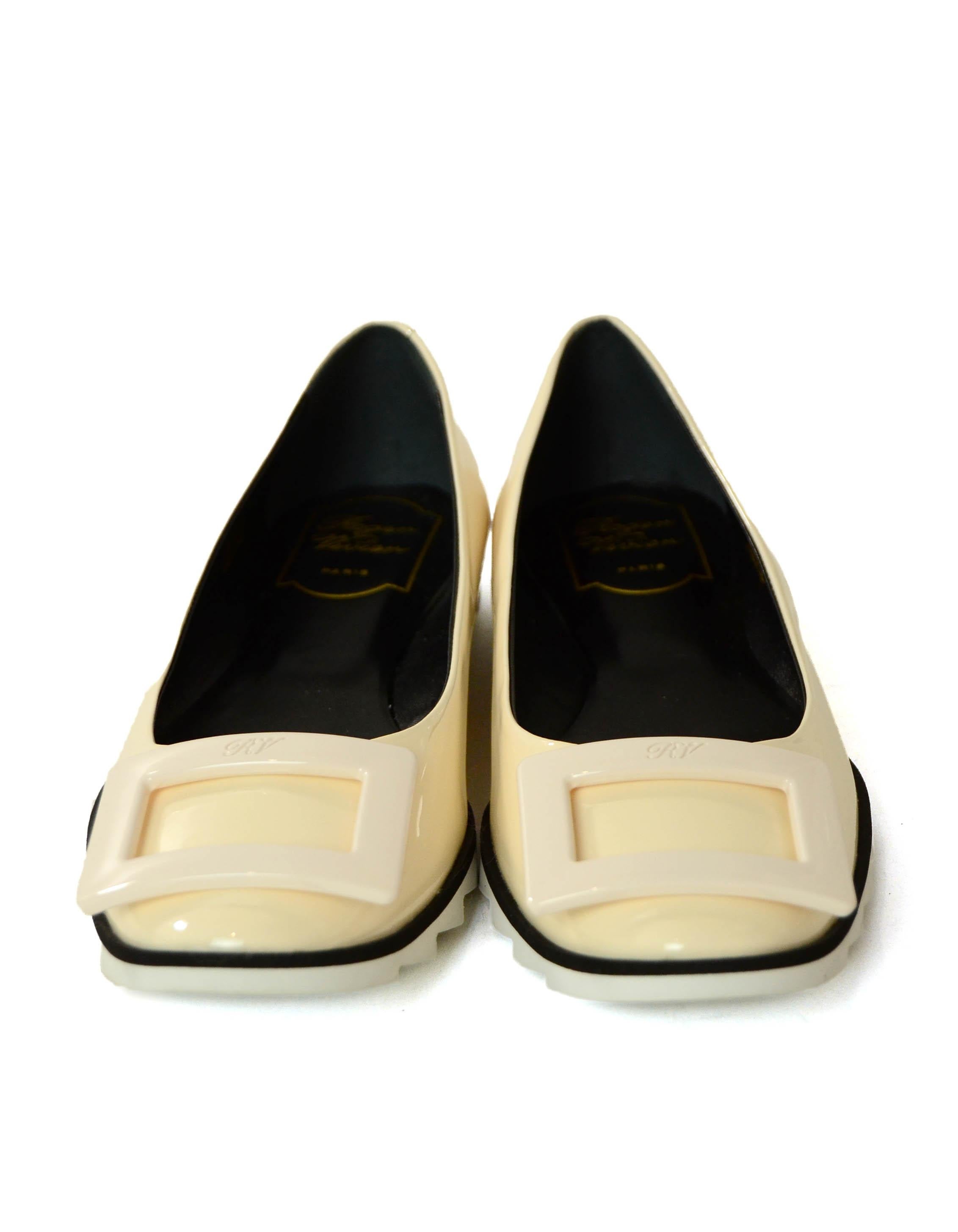 Roger Vivier Cream Patent Flats w/Buckle

Made In: Italy
Color: Cream
Hardware: Resin
Materials: Patent Leather
Closure/Opening: Slip on
Overall Condition: Excellent like new, never worn
Retail: $675

Marked Size: 37
Heel Height: .25” 