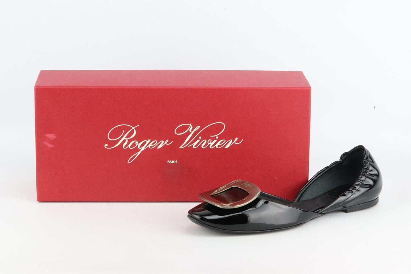 These d’orsay ballet flats by Roger Vivier are topped with the brand's signature buckle - a detail that dates back to the '60s, they've been crafted in Italy from smooth black patent-leather and have sleek almond toe. Rubber sole measures