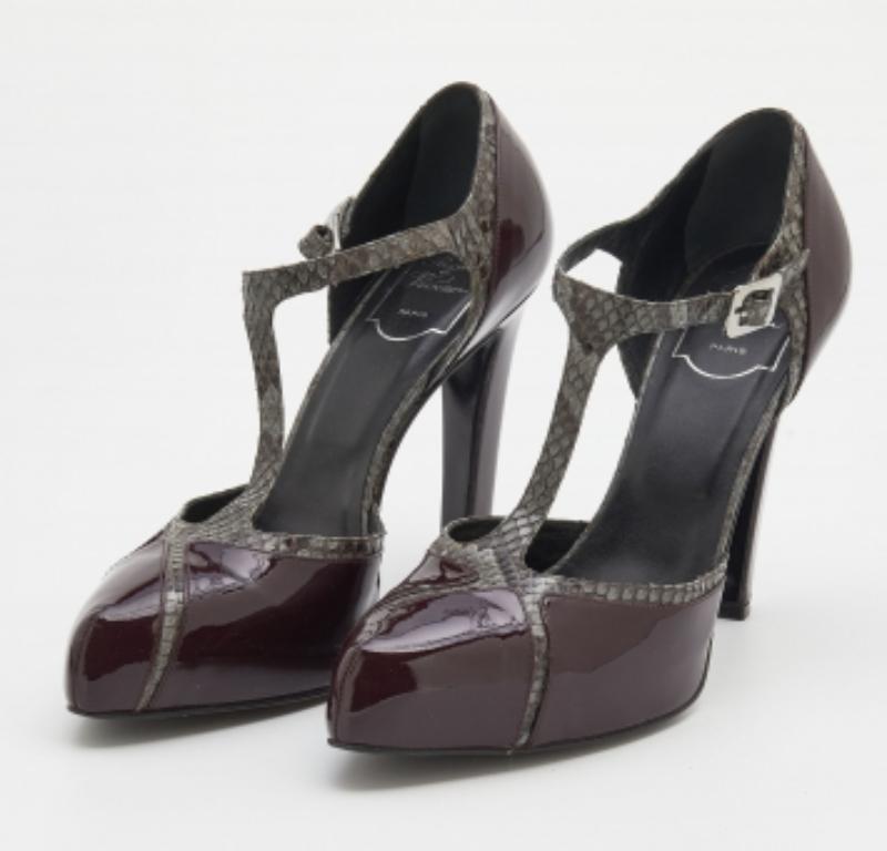 Queste splendide décolleté di Roger Vivier sono state realizzate in pitone e vernice e sono state progettate per completare i tuoi abiti eleganti. Sono dotate di comode solette in pelle e si elevano su plateau e tacchi di 11,5 cm.