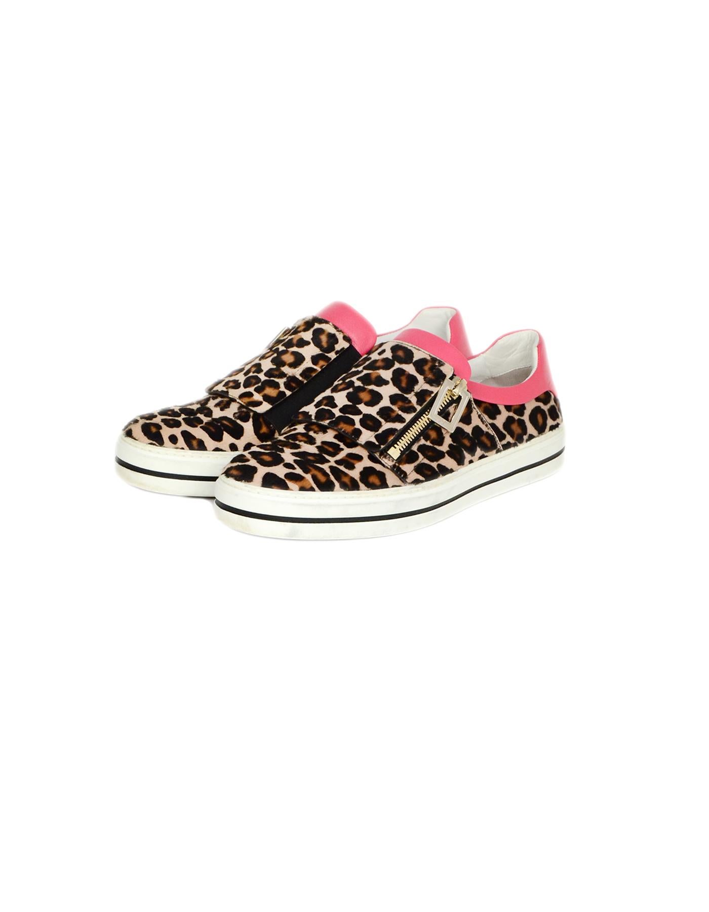 Roger Vivier Leopard Print Sneaky Viv Calf Hair Sneakers w/ Pink Leather Trim sz 38 rt $1,050

Made In: Italy
Color: Leopard print, pink
Materials: Calf hair, leather trim
Closure/Opening: Slide on 
Overall Condition: Very good pre-owned condition,