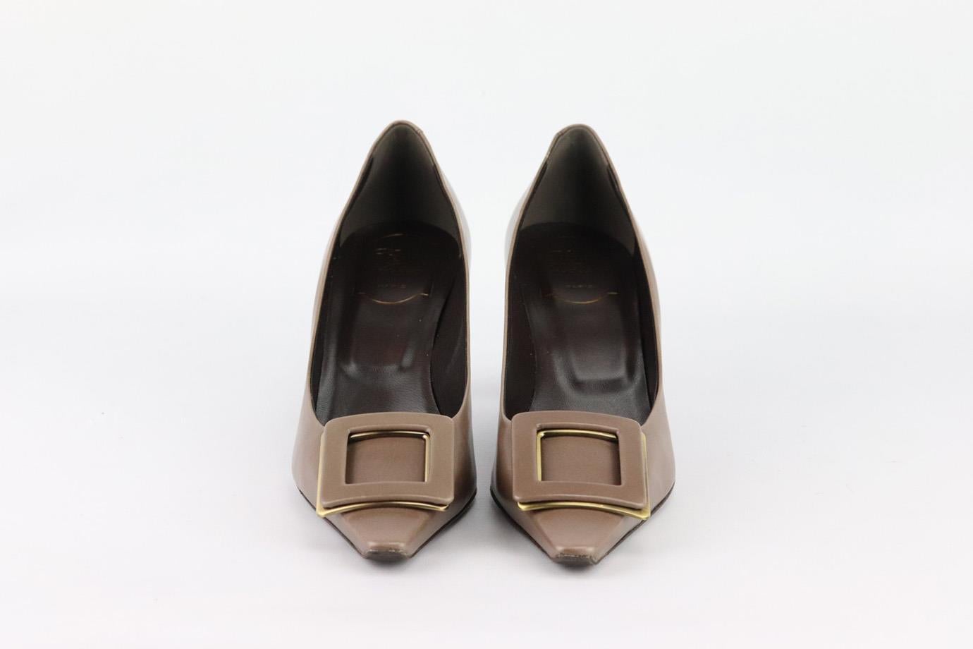 These pumps by Roger Vivier are an elegant re-creation of the founder's original 1965 design, they're made from taupe matte leather and embellished with a tonal signature buckle that tops the pointed toe. Heel measures approximately 63 mm/ 2.5
