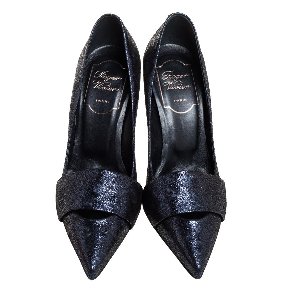 Treat yourself to these gorgeous pair of leather pumps exclusively made for the diva that you are. Add this exquisite pair of Roger Vivier pumps to your wardrobe for an element of luxe and comfort. These metallic blue crackle pointed-toe pumps are a