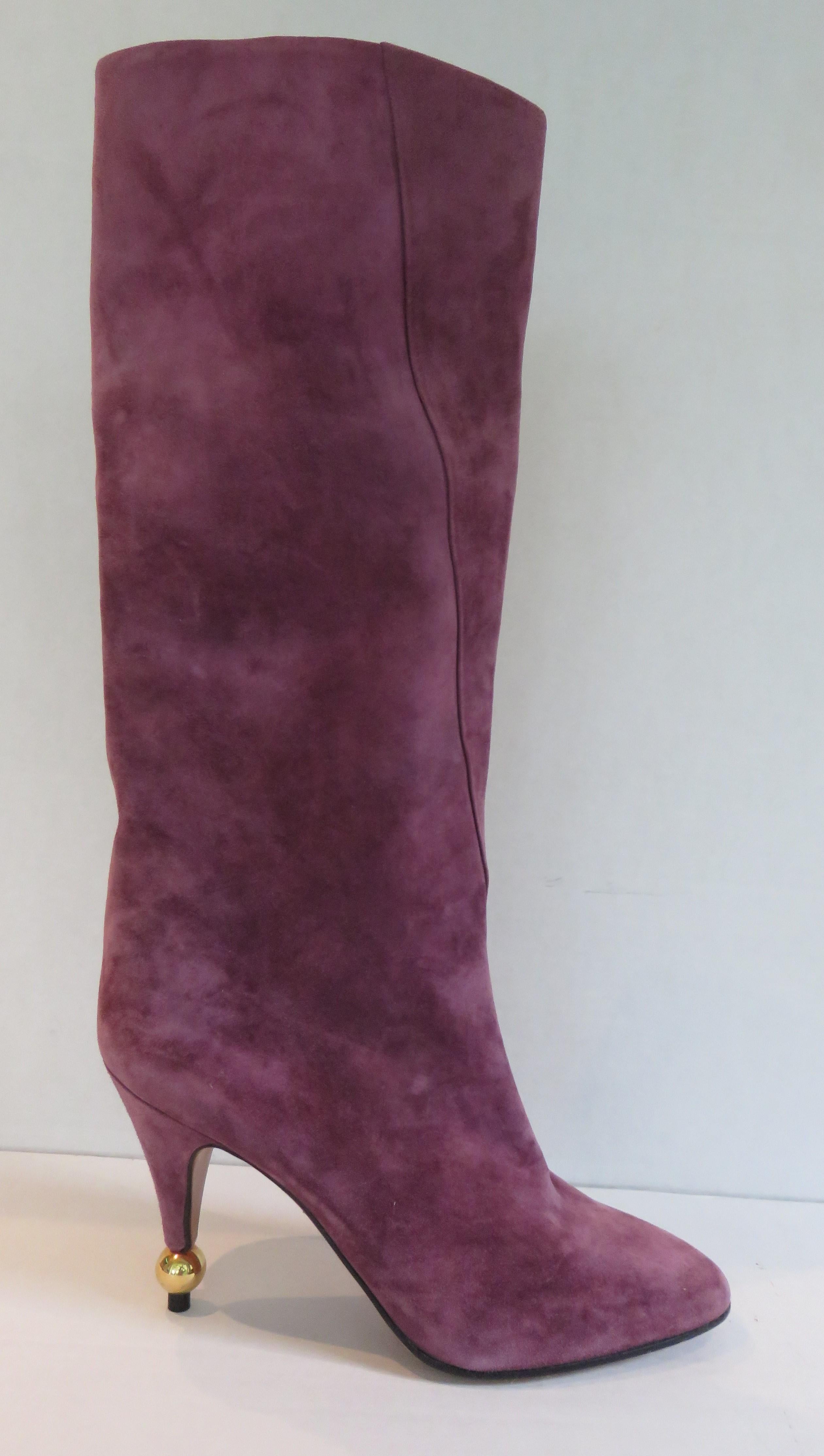 Gorgeous purple suede boots by Roger Vivier from his original ball heel collection of the 1980s. They have a straight 13